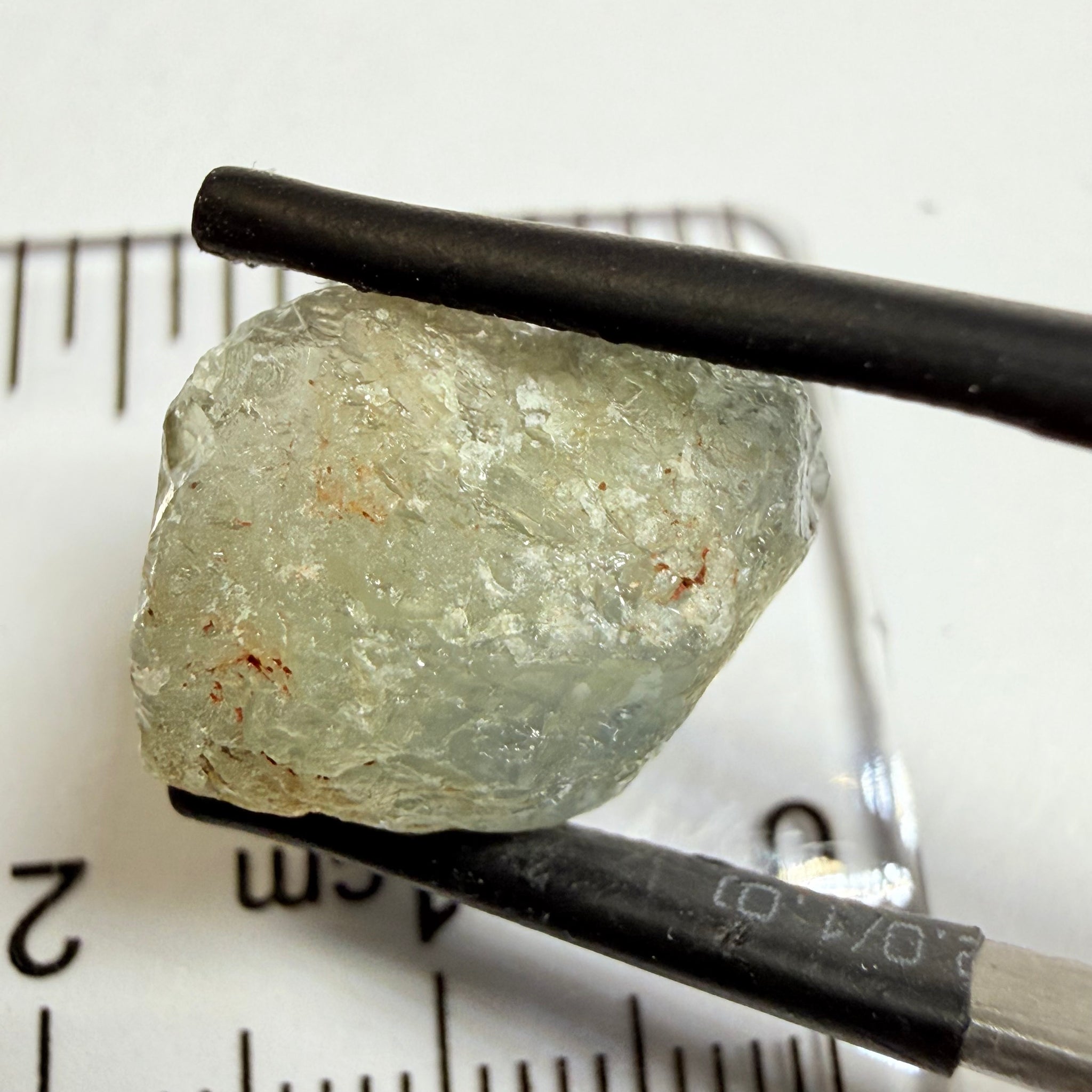 Umba Sapphire, 14.72ct, Umba Valley, Tanzania, Untreated Unheated. Slightly to moderately included,  slight silk, crack going a 1/4 way in. See the backlit pics  I have circled the crack, minor fissures to be removed before faceting