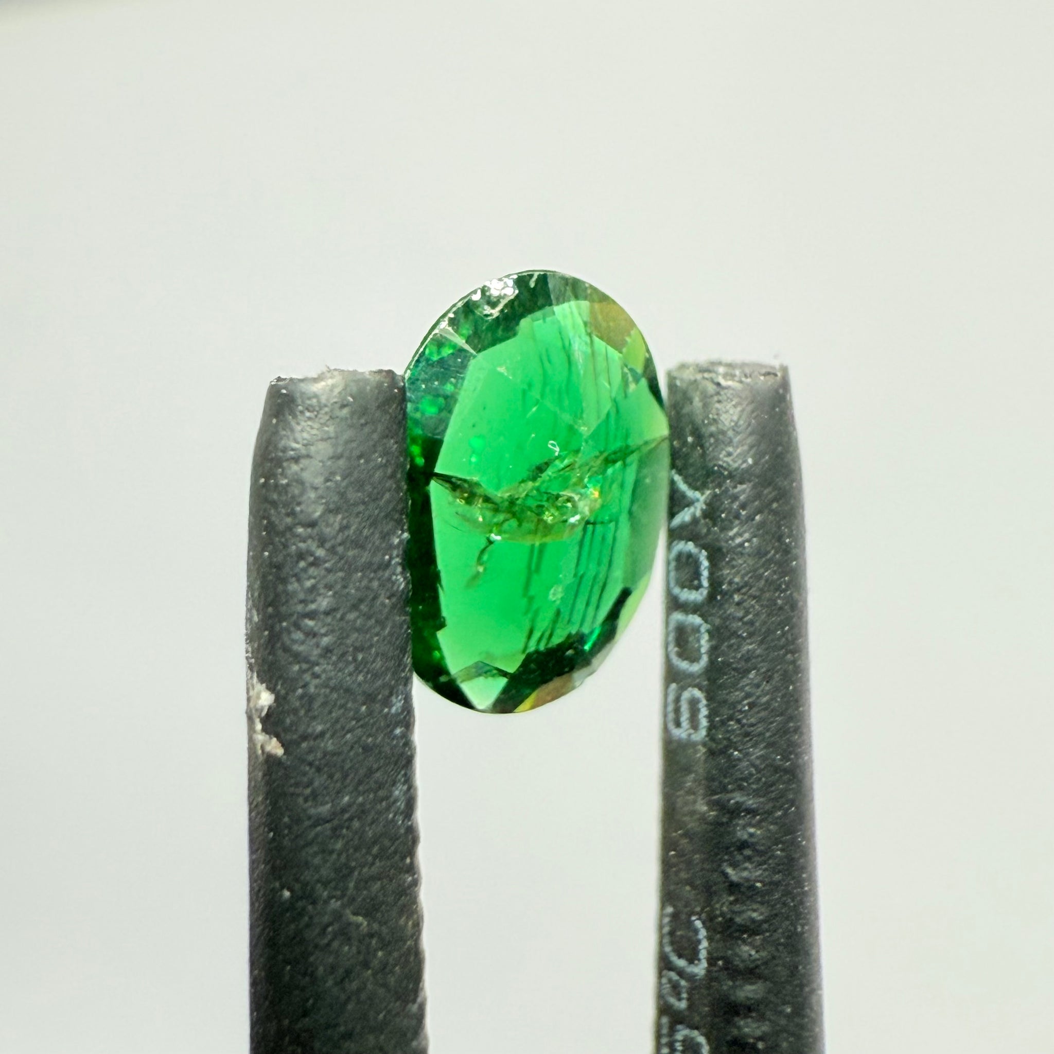 Chrome Tourmaline, 0.41ct, Landanai, Tanzania, Untreated Unheated, native cut, heavily included, flat shape, priced accordingly