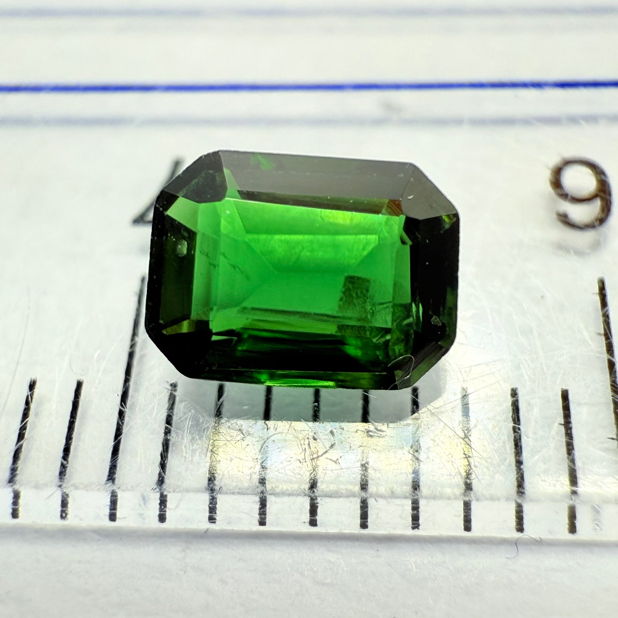 Chrome Tourmaline, 0.54ct, Landanai, Tanzania, Untreated Unheated, native cut, slight dent on a crown facet, priced accordingly