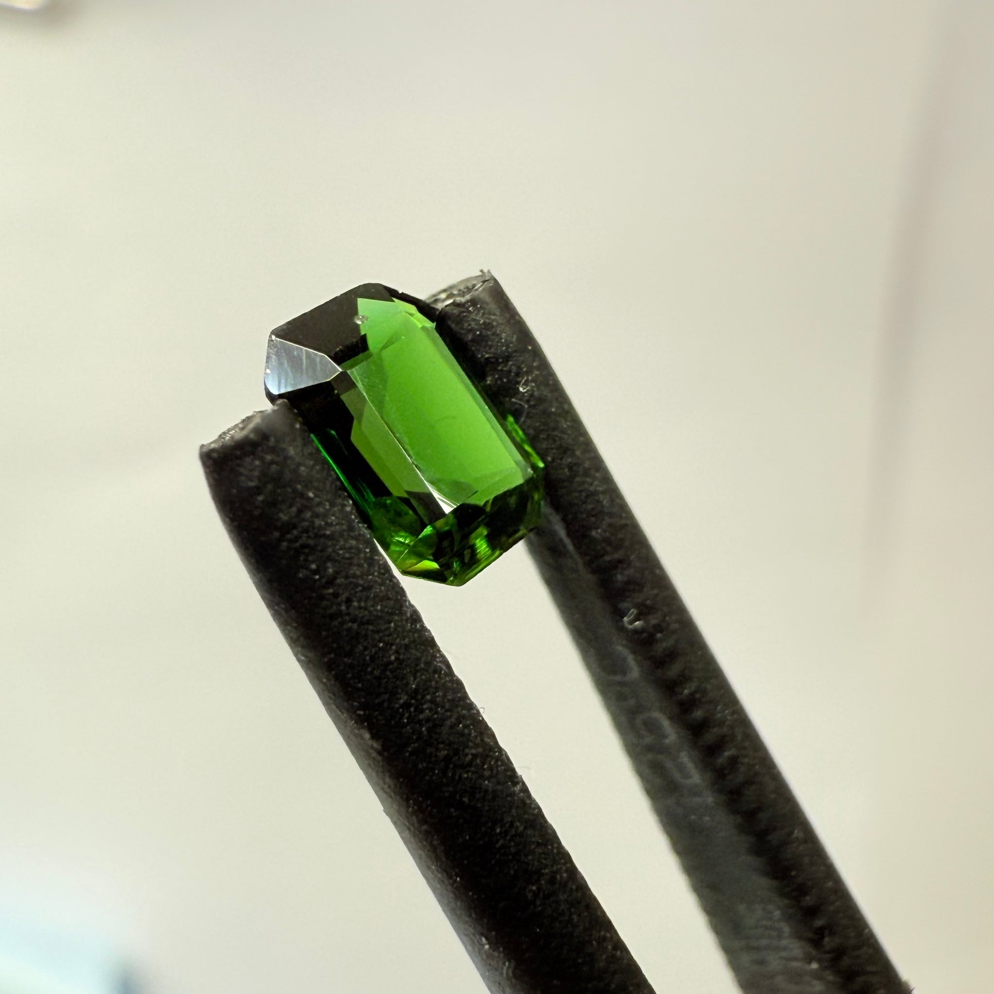 Chrome Tourmaline, 0.54ct, Landanai, Tanzania, Untreated Unheated, native cut, slight dent on a crown facet, priced accordingly