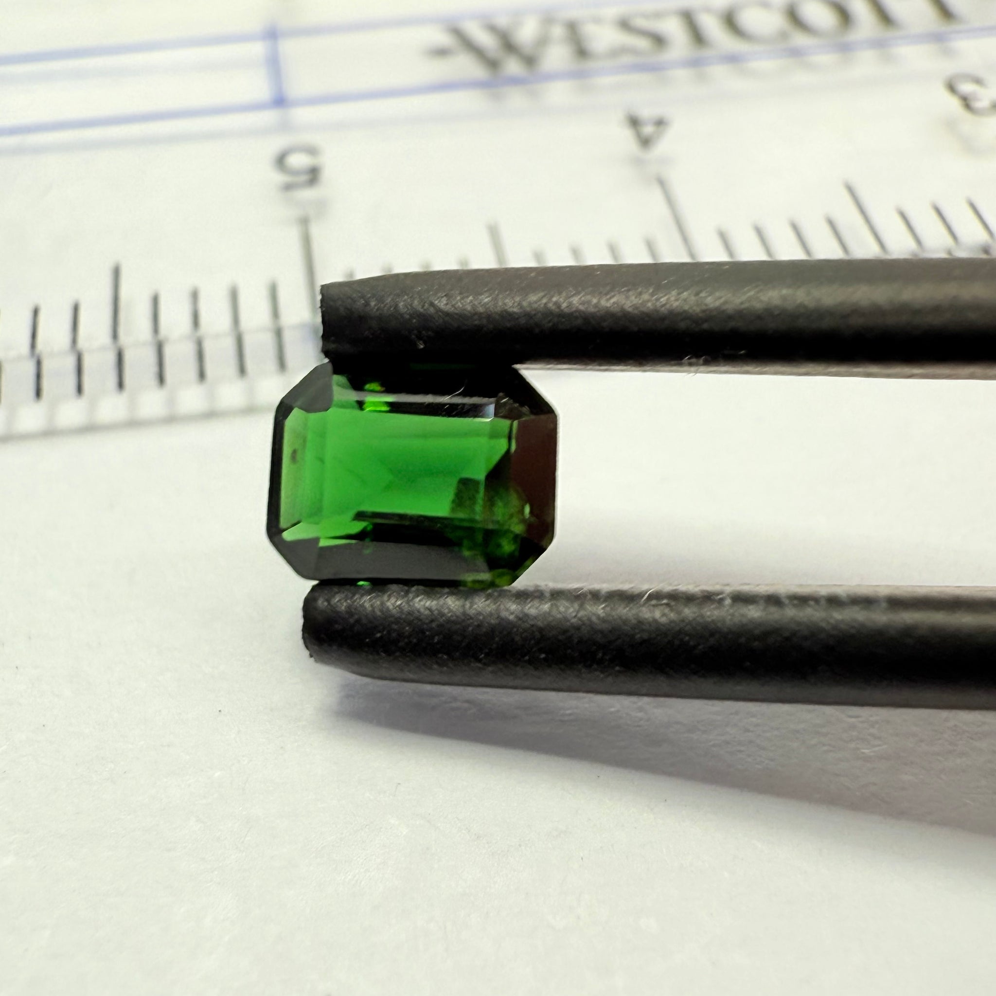 Chrome Tourmaline, 0.54ct, Landanai, Tanzania, Untreated Unheated, native cut, slight dent on a crown facet, priced accordingly