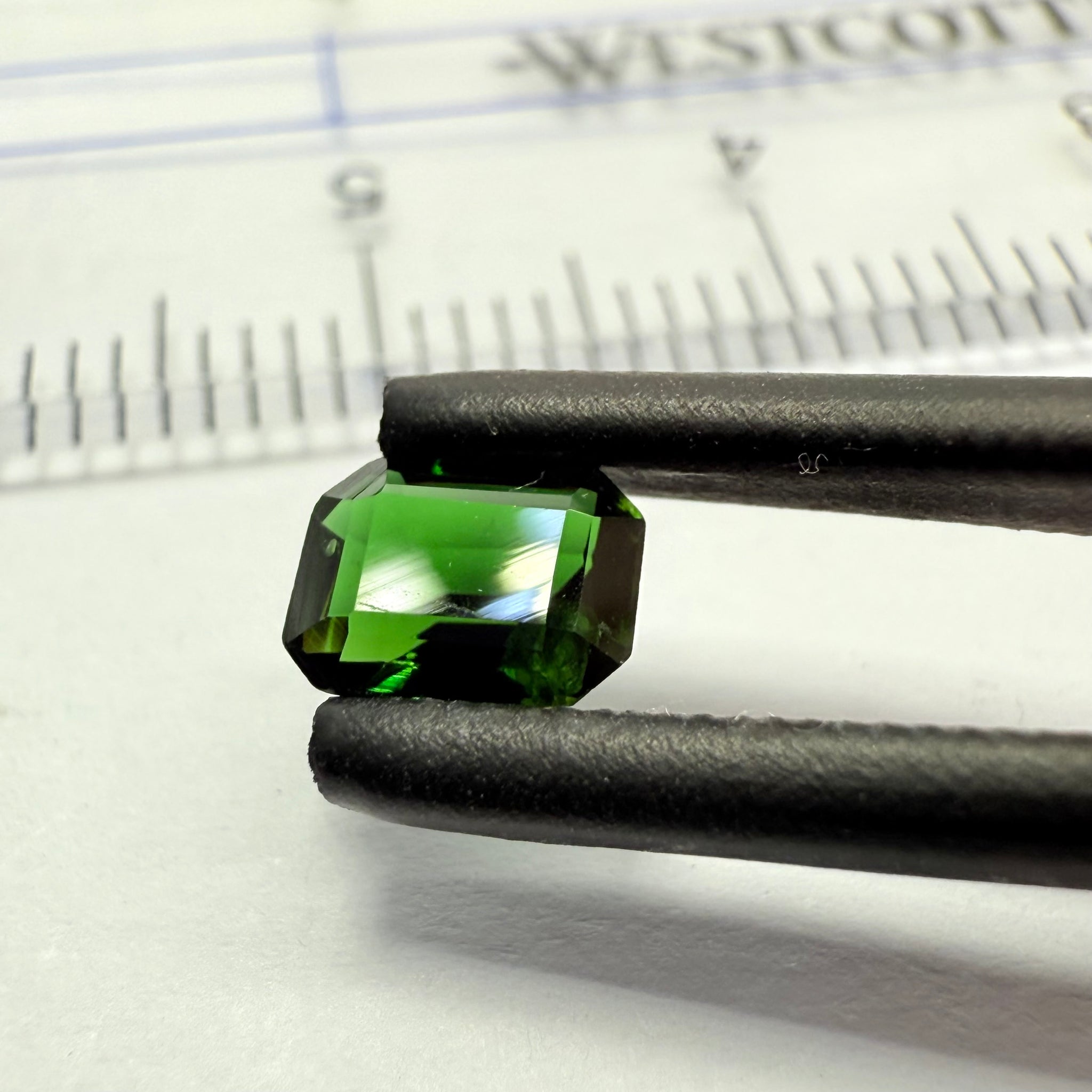 Chrome Tourmaline, 0.54ct, Landanai, Tanzania, Untreated Unheated, native cut, slight dent on a crown facet, priced accordingly