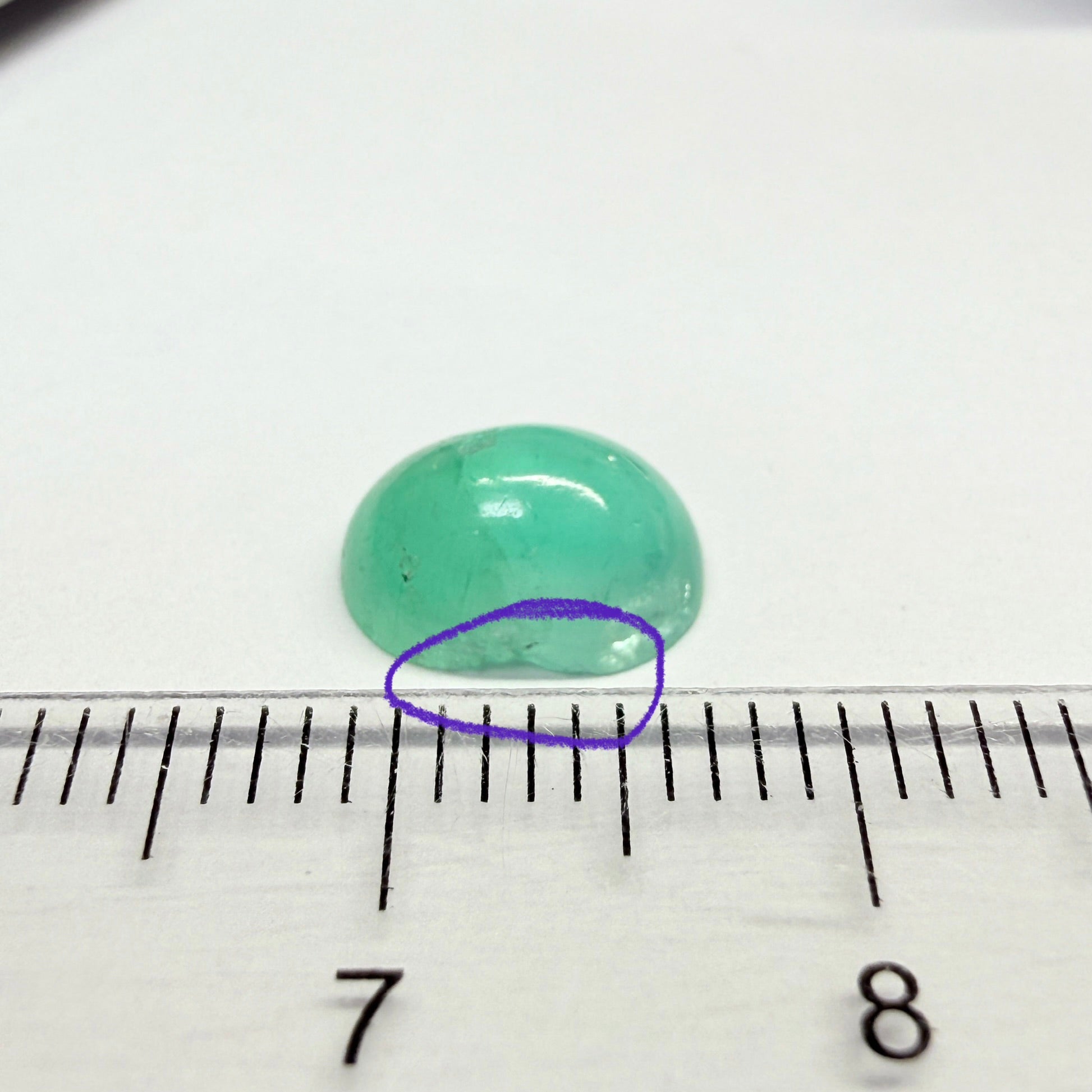 Tanzanian Emerald, 2.03ct, NO OIL, Untreated Unheated, slight chip at the bottom, circled