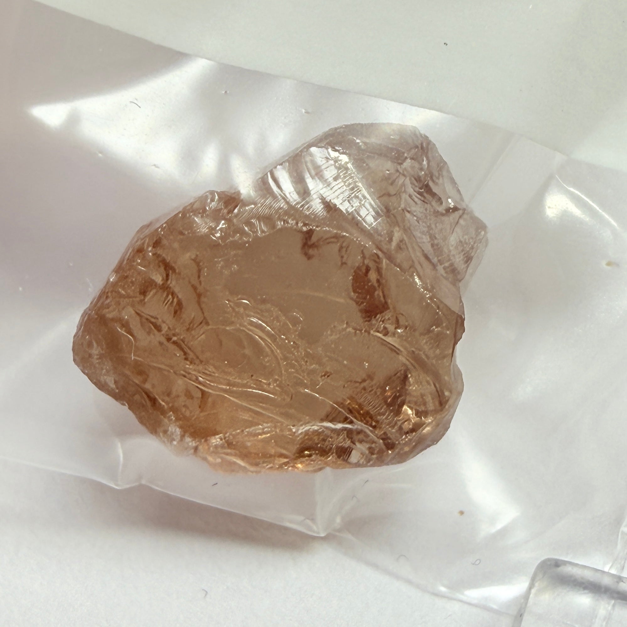 Malaya Garnet, 6.44ct, Tanzania, Untreated Unheated, inclusion on the outside, see marked circle, rest faint needles, shape flattish, see pics