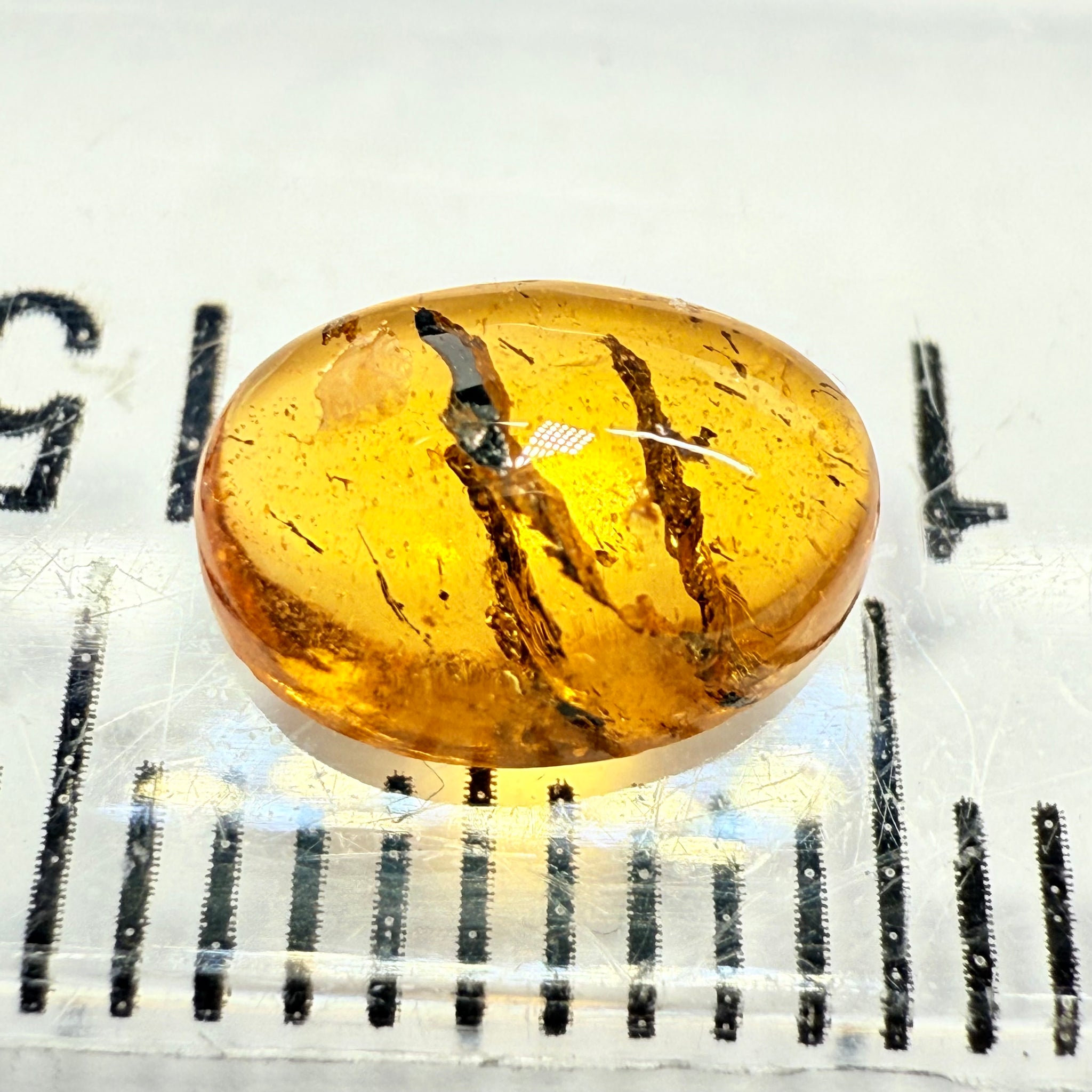 Mandarin Spessartite Cabochon, 1.89ct, Loliondo, Tanzania, Untreated Unheated, very interesting inclusions