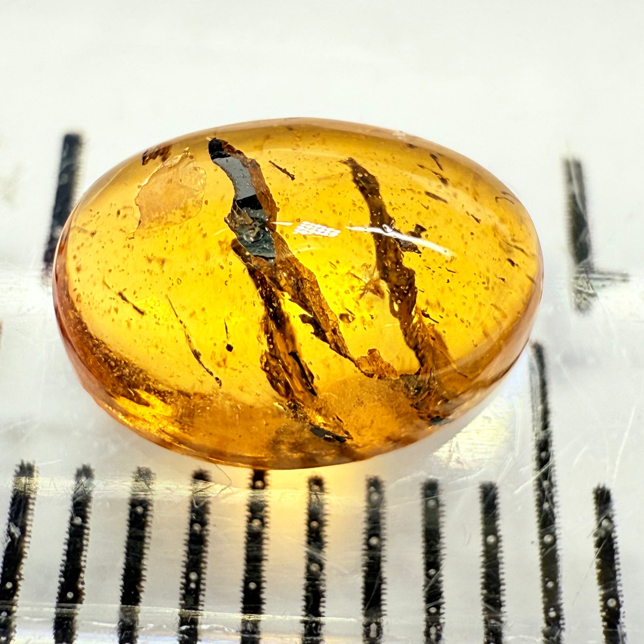 Mandarin Spessartite Cabochon, 1.89ct, Loliondo, Tanzania, Untreated Unheated, very interesting inclusions