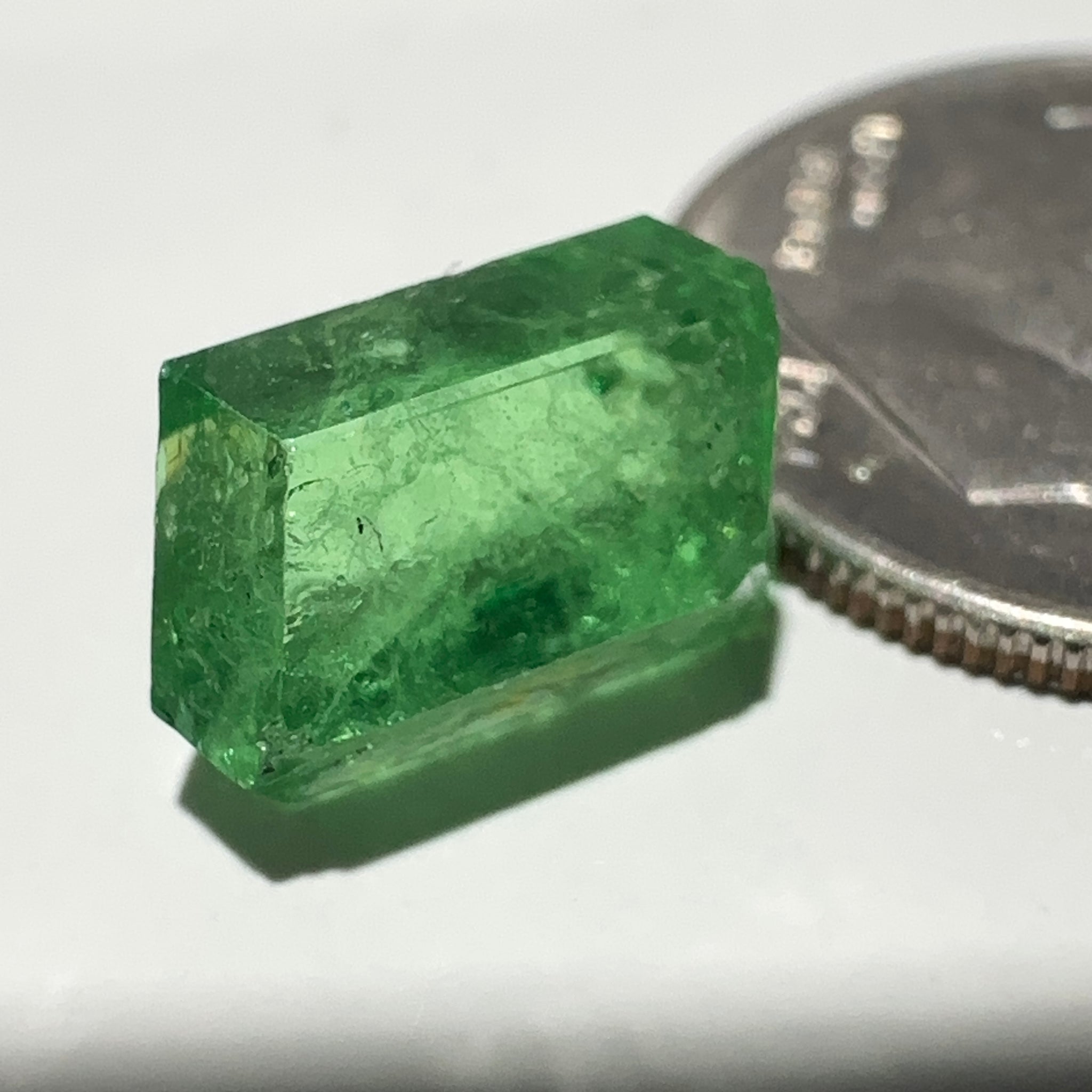 Tsavorite Garnet Crystal, 3.65ct A very unusual Tsavorite crystal from Merelani in Tanzania, Untreated Unheated, see the photos taken in different lights