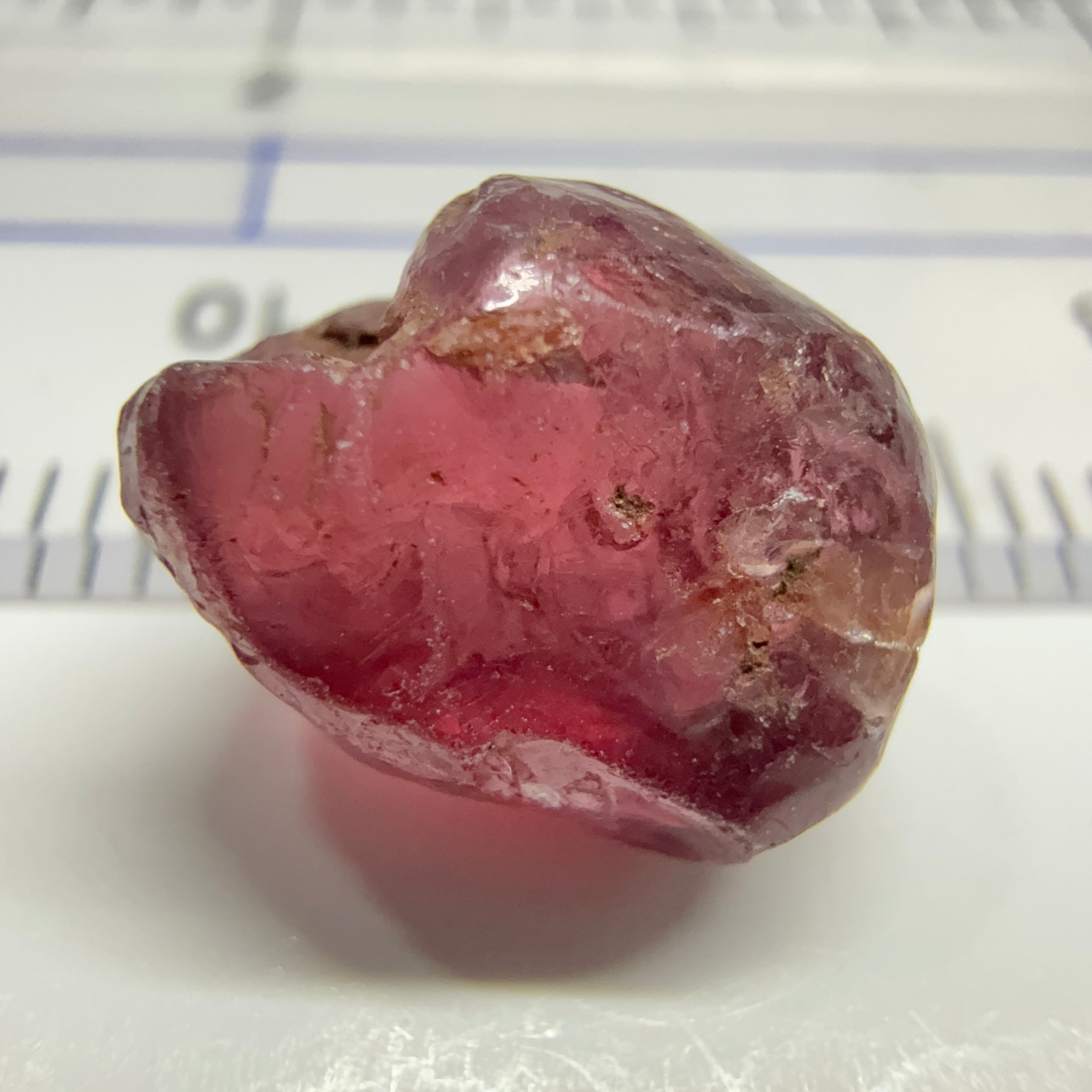 Rhodolite Garnet Colour Shifting, 8.46ct, Umba, Tanzania, Untreated Untreated. Slight skin issue (2mm on one side) will come off on faceting, rest vvs-if
