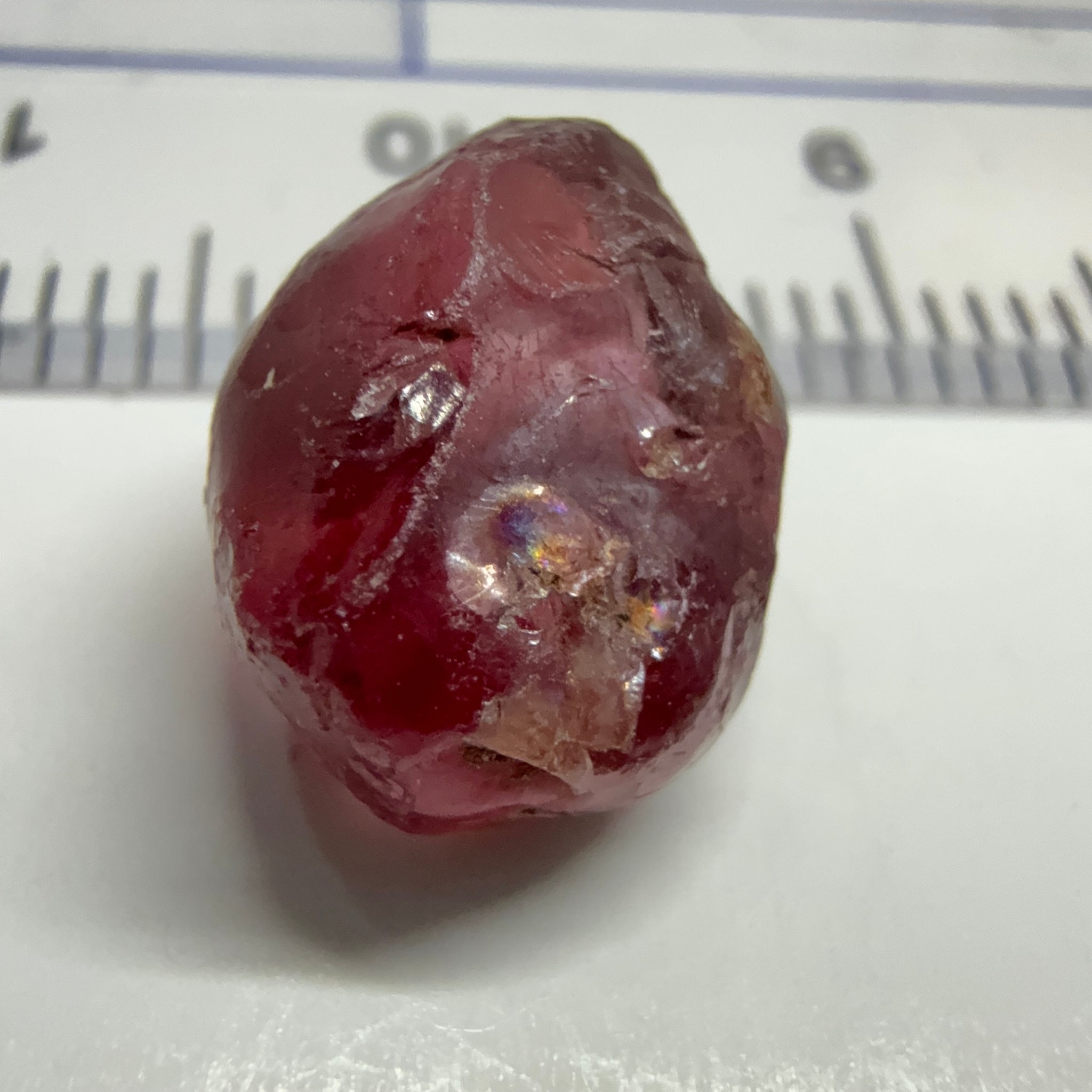 Rhodolite Garnet Colour Shifting, 8.46ct, Umba, Tanzania, Untreated Untreated. Slight skin issue (2mm on one side) will come off on faceting, rest vvs-if