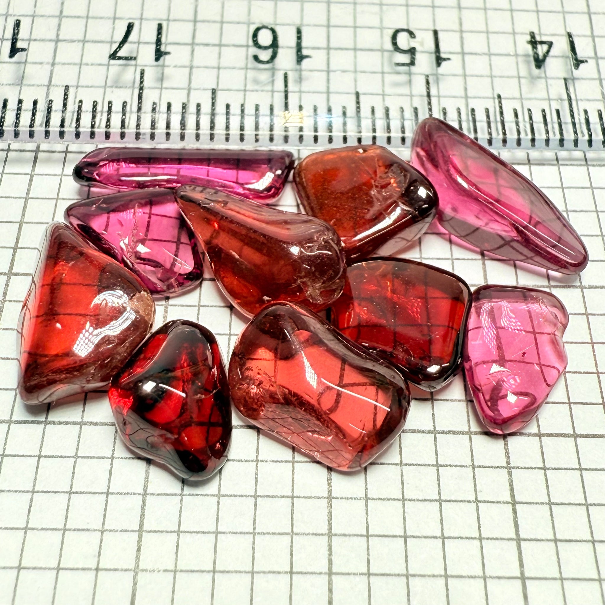 Mix Tanzanian Garnet Lot, Freeform Cabochons, 31.45ct, from multiple areas in Tanzania, Untreated Unheated, great for designers getting creative, very high polish, excellent transparency. 10 pc lot, 3.0ct av.