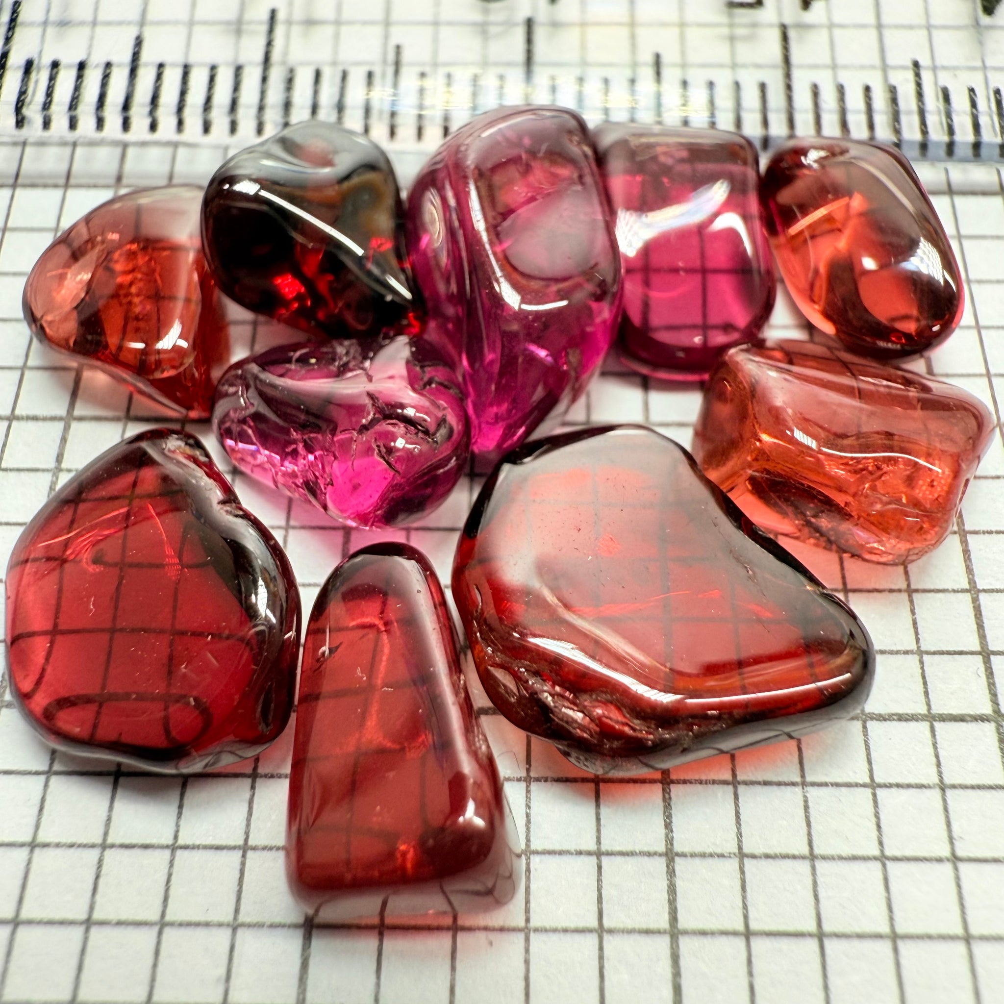Mix Tanzanian Garnet Lot, Freeform Cabochons, 33.46ct, from multiple areas in Tanzania, Untreated Unheated, great for designers getting creative, very high polish, excellent transparency. 10 pc lot, 3.3ct av.