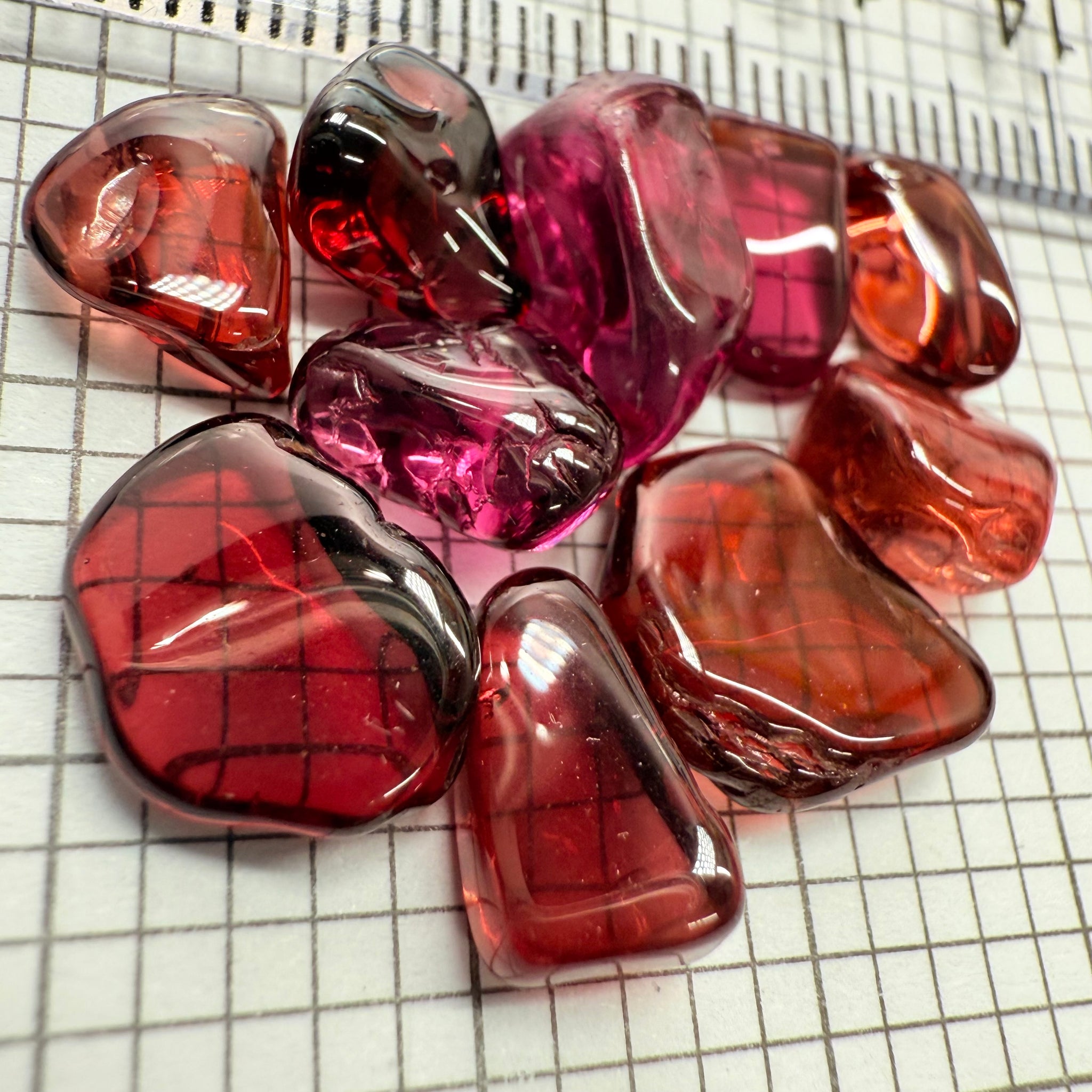 Mix Tanzanian Garnet Lot, Freeform Cabochons, 33.46ct, from multiple areas in Tanzania, Untreated Unheated, great for designers getting creative, very high polish, excellent transparency. 10 pc lot, 3.3ct av.