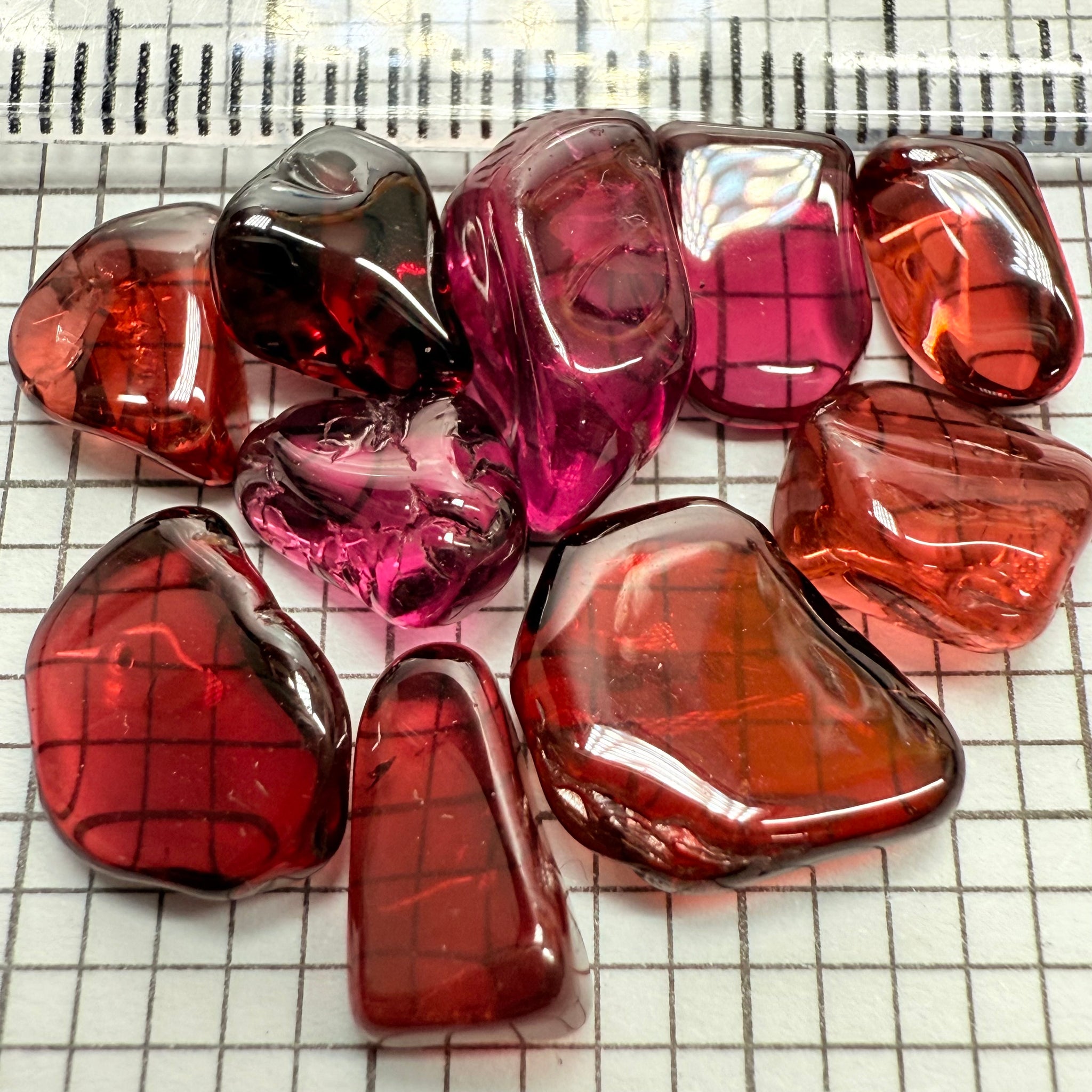 Mix Tanzanian Garnet Lot, Freeform Cabochons, 33.46ct, from multiple areas in Tanzania, Untreated Unheated, great for designers getting creative, very high polish, excellent transparency. 10 pc lot, 3.3ct av.
