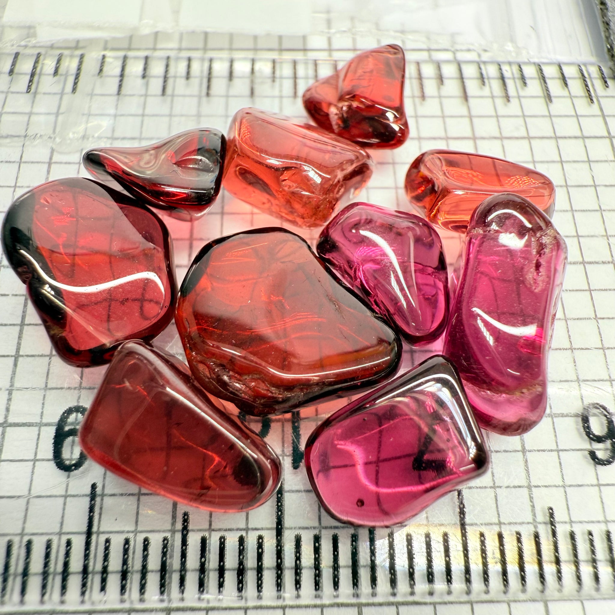 Mix Tanzanian Garnet Lot, Freeform Cabochons, 33.46ct, from multiple areas in Tanzania, Untreated Unheated, great for designers getting creative, very high polish, excellent transparency. 10 pc lot, 3.3ct av.
