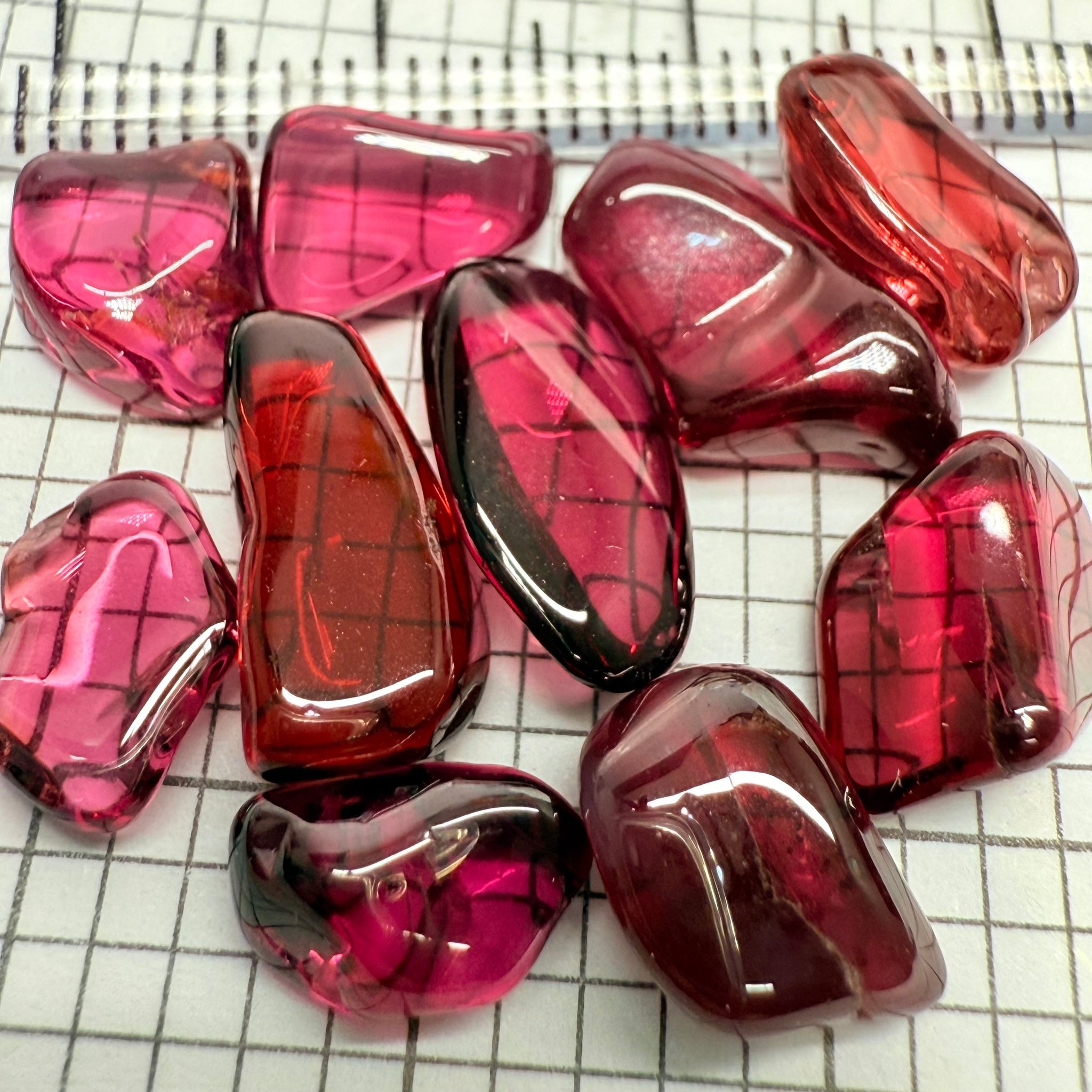 Mix Tanzanian Garnet Lot, Freeform Cabochons, 33.03ct, from multiple areas in Tanzania, Untreated Unheated, great for designers getting creative, very high polish, excellent transparency. 10 pc lot, 3.3ct av.