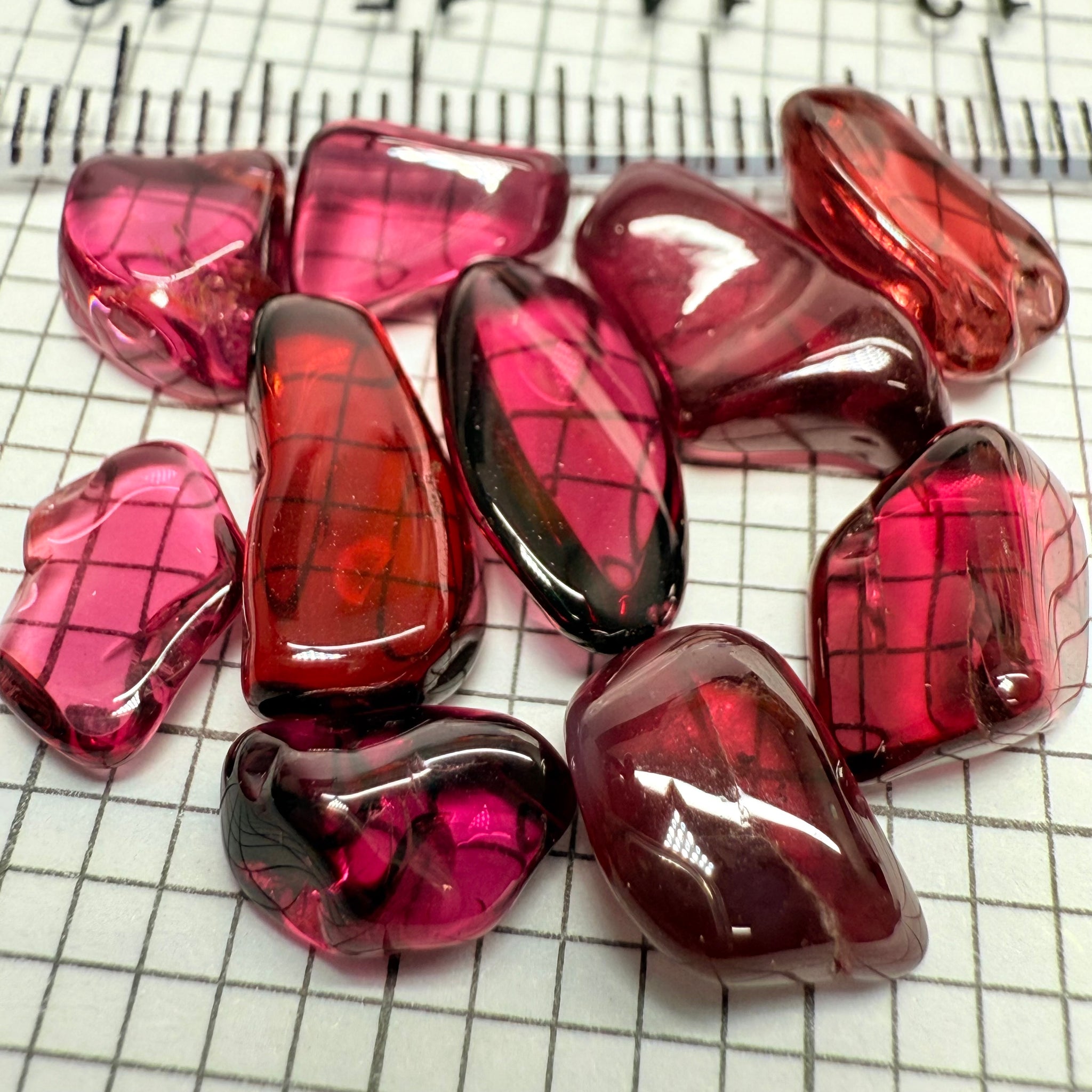 Mix Tanzanian Garnet Lot, Freeform Cabochons, 33.03ct, from multiple areas in Tanzania, Untreated Unheated, great for designers getting creative, very high polish, excellent transparency. 10 pc lot, 3.3ct av.