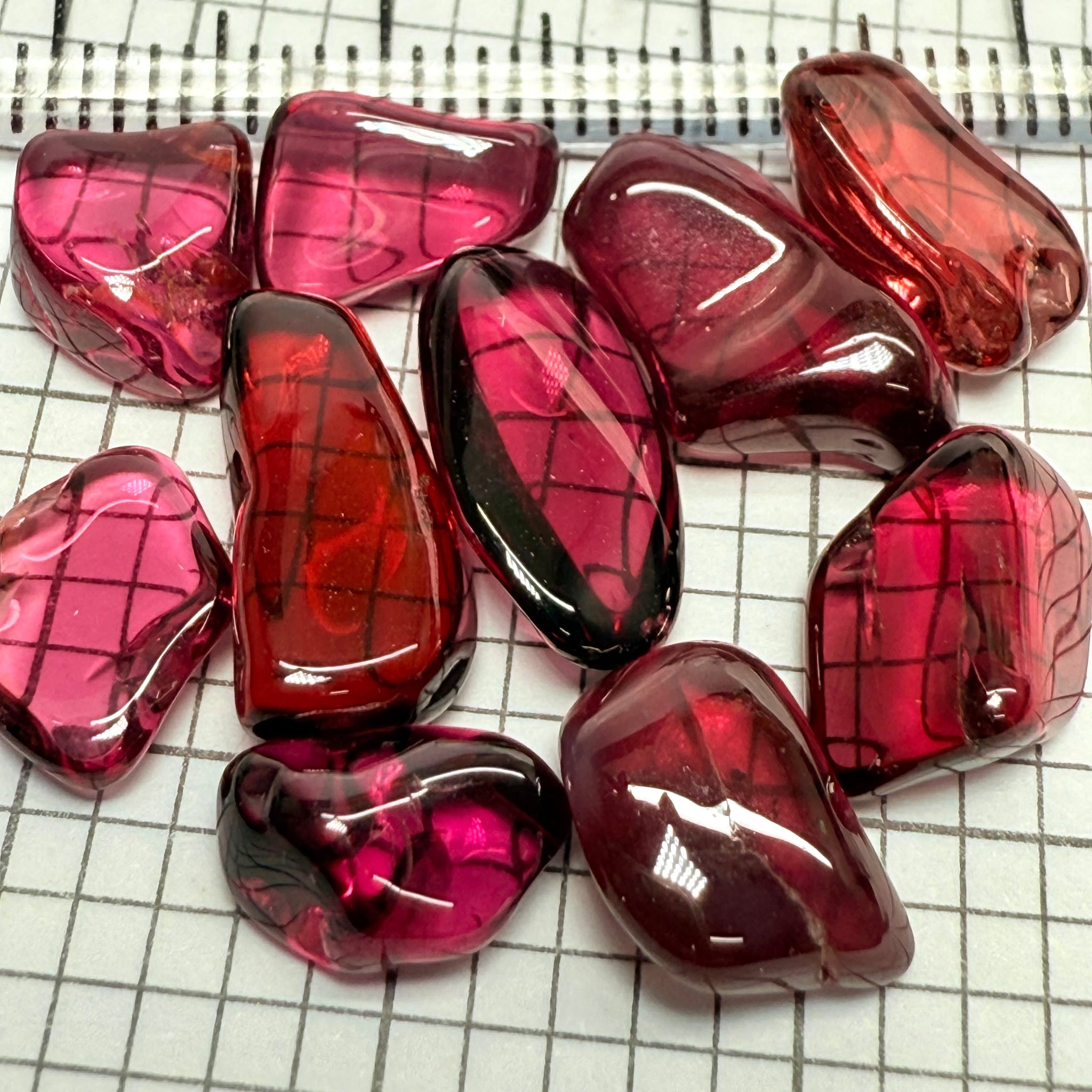 Mix Tanzanian Garnet Lot, Freeform Cabochons, 33.03ct, from multiple areas in Tanzania, Untreated Unheated, great for designers getting creative, very high polish, excellent transparency. 10 pc lot, 3.3ct av.
