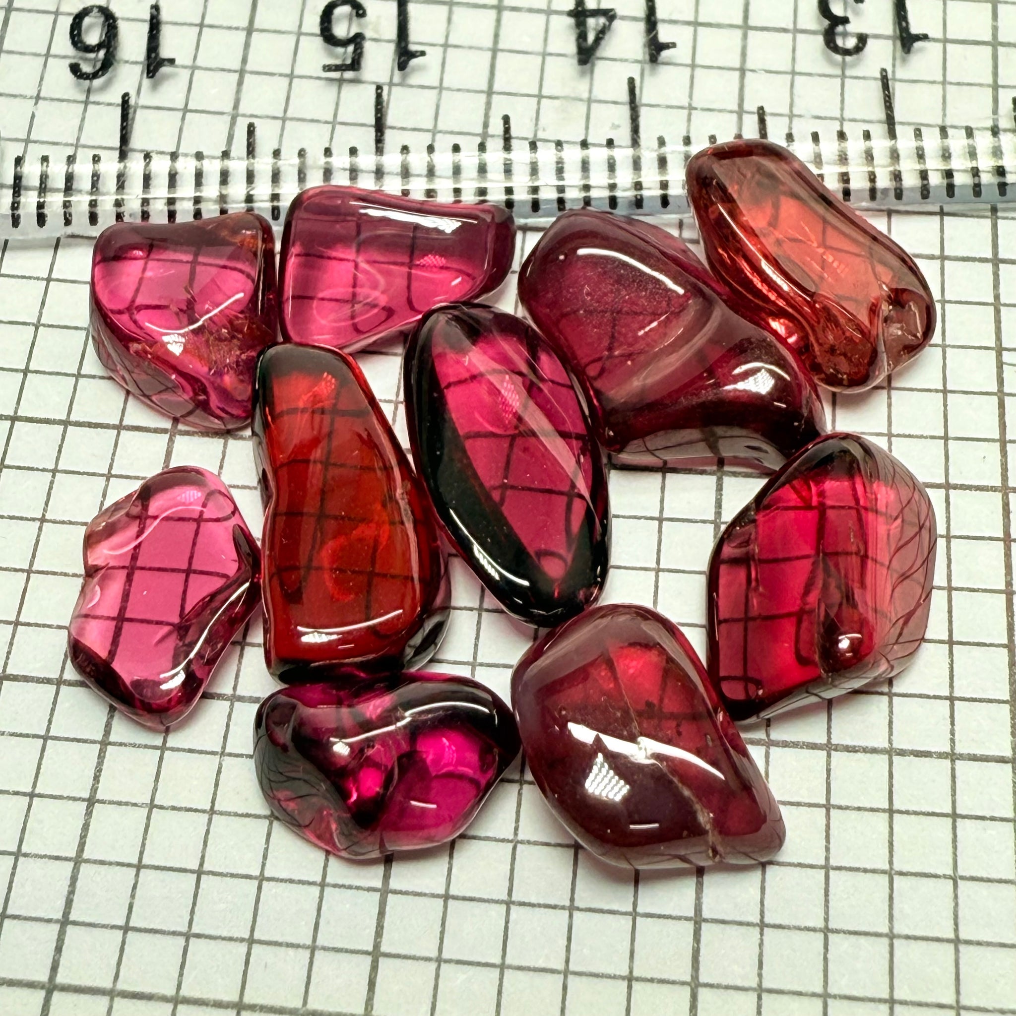 Mix Tanzanian Garnet Lot, Freeform Cabochons, 33.03ct, from multiple areas in Tanzania, Untreated Unheated, great for designers getting creative, very high polish, excellent transparency. 10 pc lot, 3.3ct av.