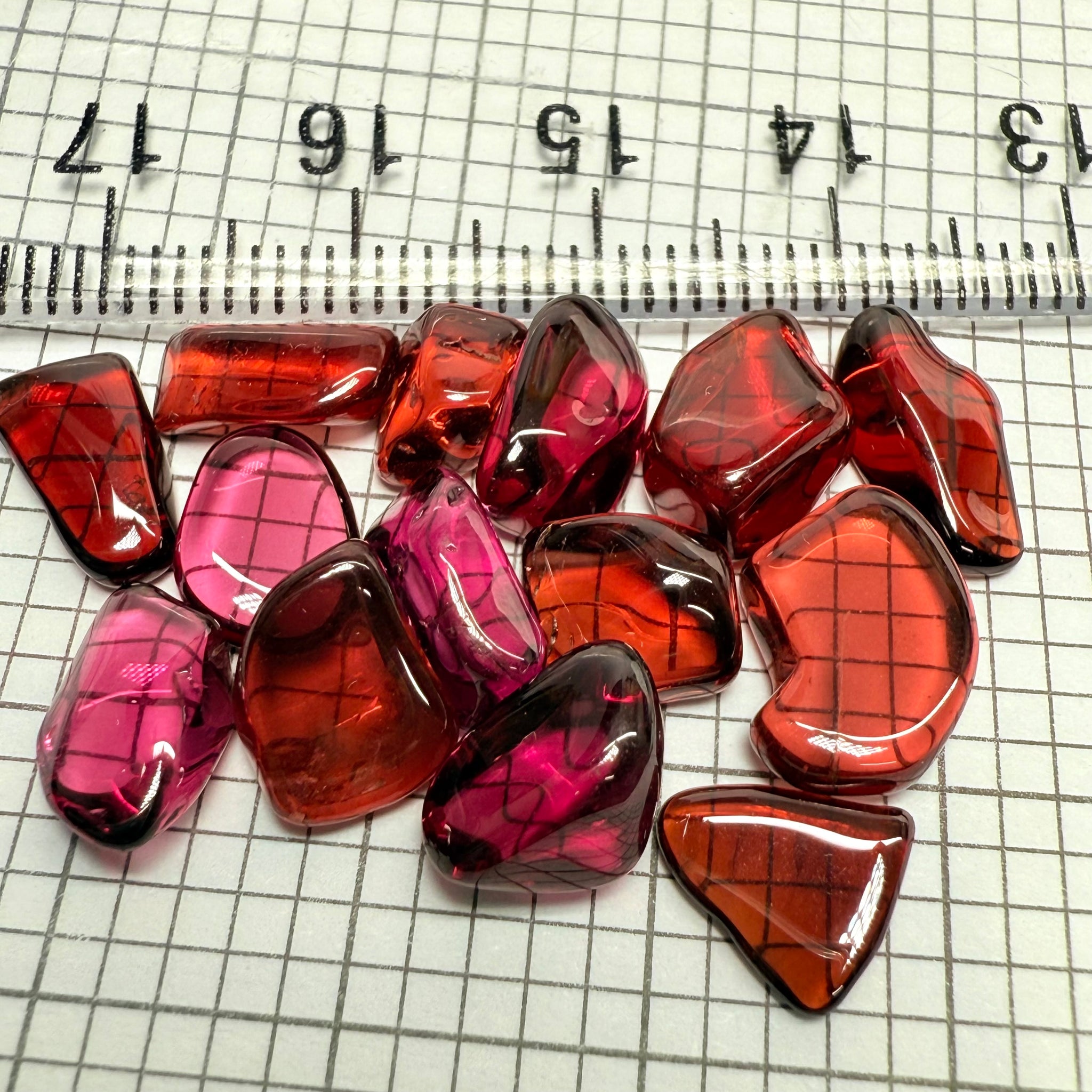 Mix Tanzanian Garnet Lot, Freeform Cabochons, 38.49ct, from multiple areas in Tanzania, Untreated Unheated, great for designers getting creative, very high polish, excellent transparency. 14 pc lot, 2.75ct av.