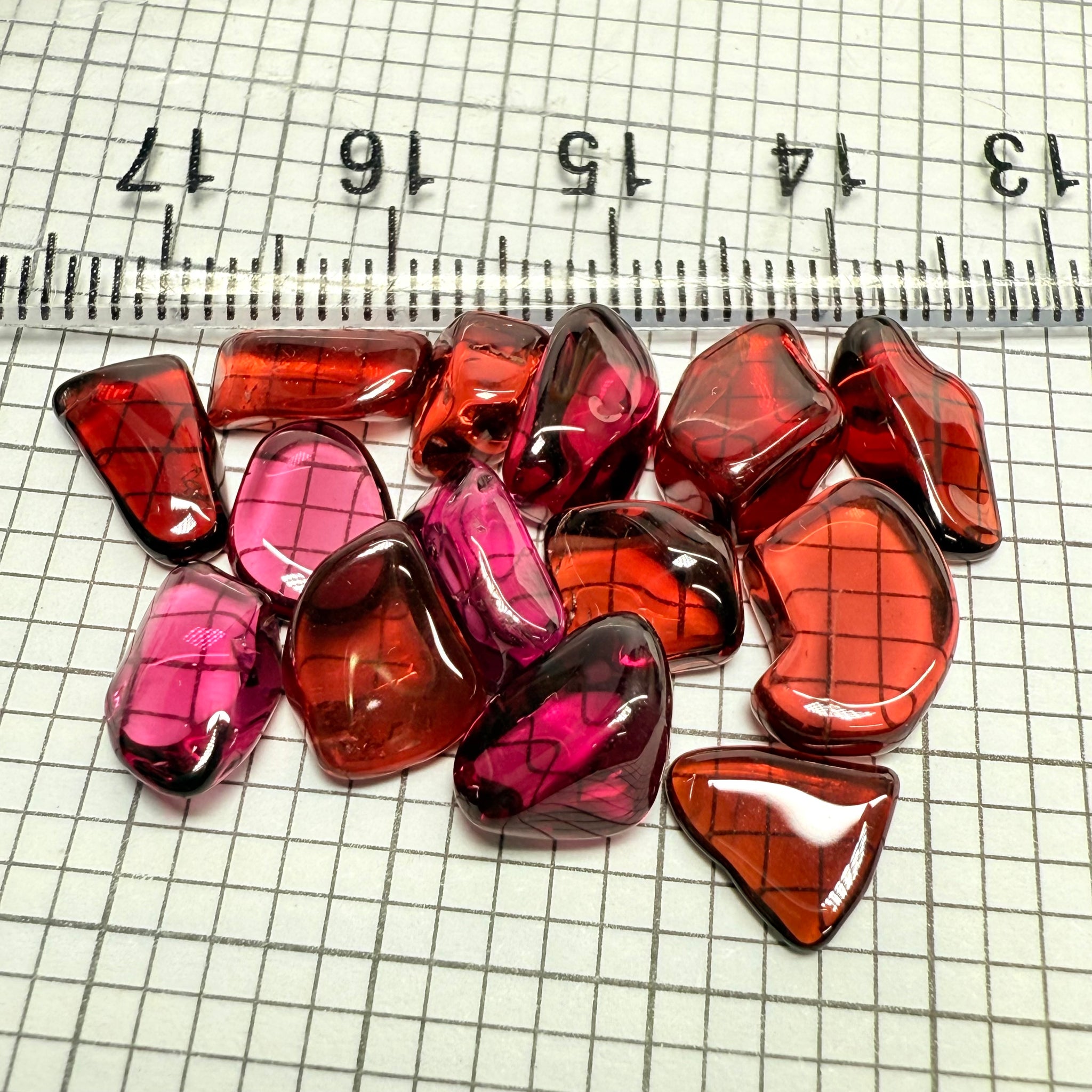 Mix Tanzanian Garnet Lot, Freeform Cabochons, 38.49ct, from multiple areas in Tanzania, Untreated Unheated, great for designers getting creative, very high polish, excellent transparency. 14 pc lot, 2.75ct av.