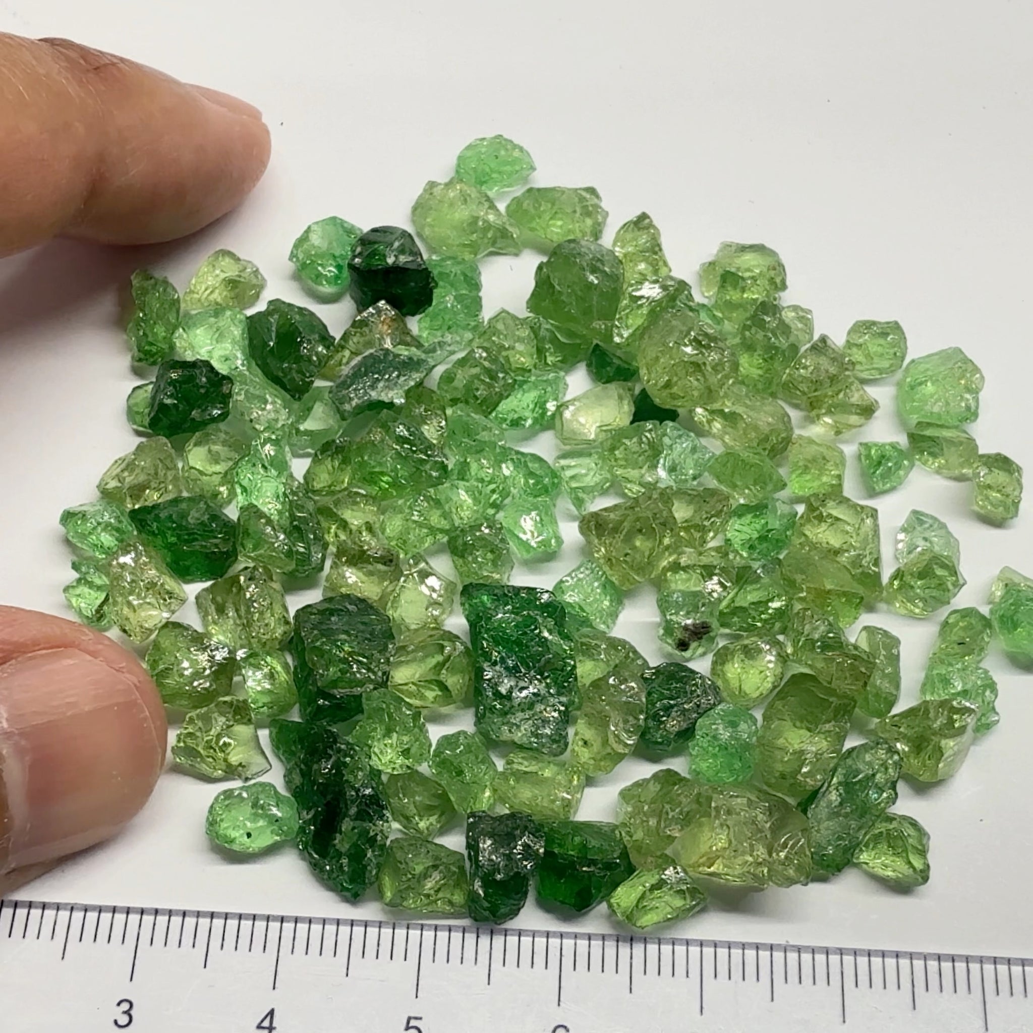 Tsavorite Garnet Lot, 33.40gm / 167.00ct Lot, Tanzania, Untreated Unheated, mixed grades from Slightly Veiled, Slightly Included to Included, there are some mint Tourmalines in here too, you will have to go though them with a dichroscope