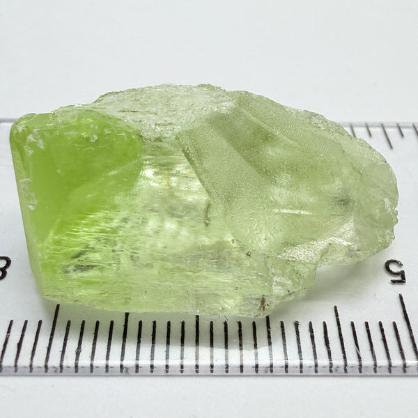 Diopside Crystal, 44.78ct, Merelani, Tanzania, Untreated Unheated,  with some fractures on the outside tip area protruding inwards, see pics I have circled the fracture area. Bulk of main center chunk clean vvs-if