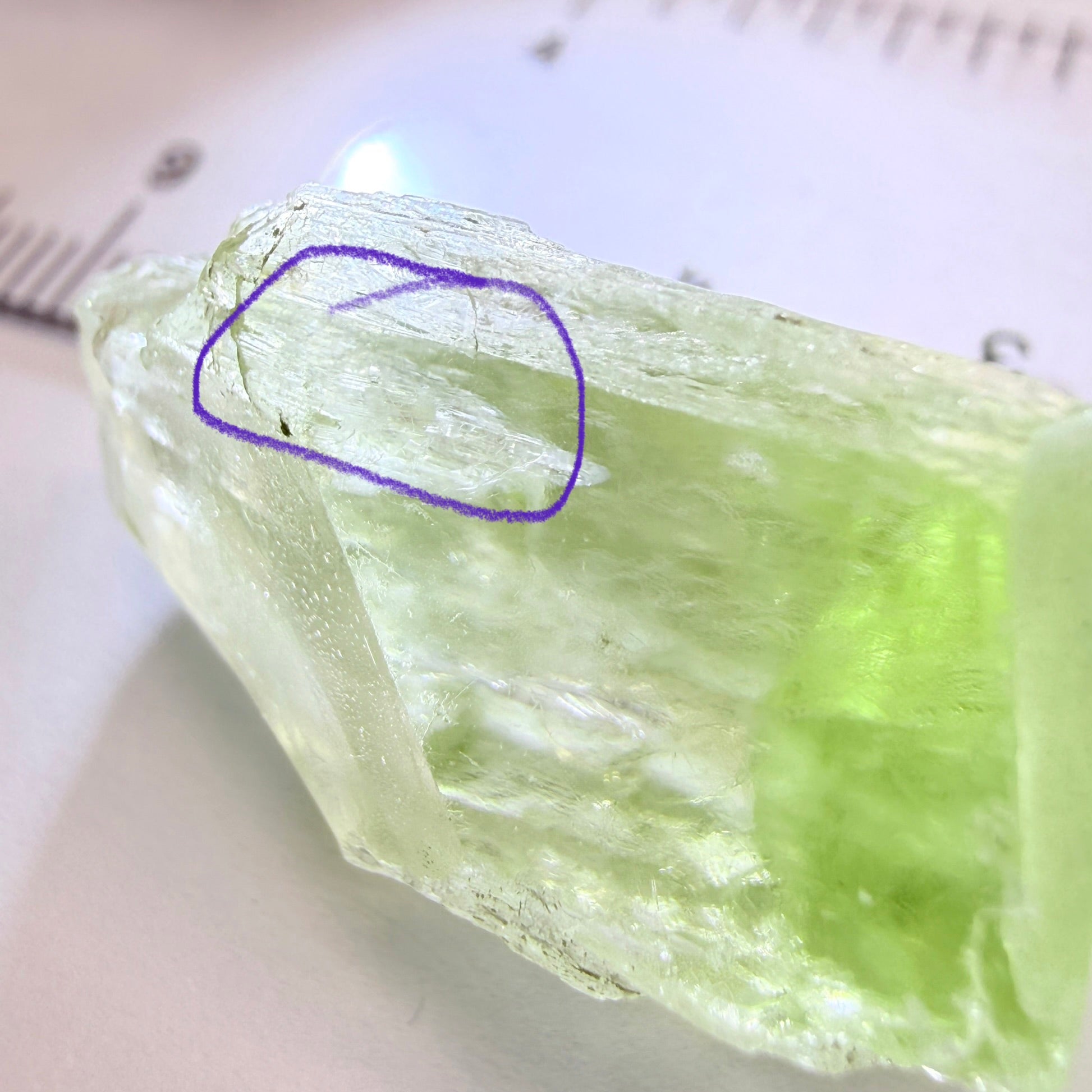 Diopside Crystal, 44.78ct, Merelani, Tanzania, Untreated Unheated,  with some fractures on the outside tip area protruding inwards, see pics I have circled the fracture area. Bulk of main center chunk clean vvs-if