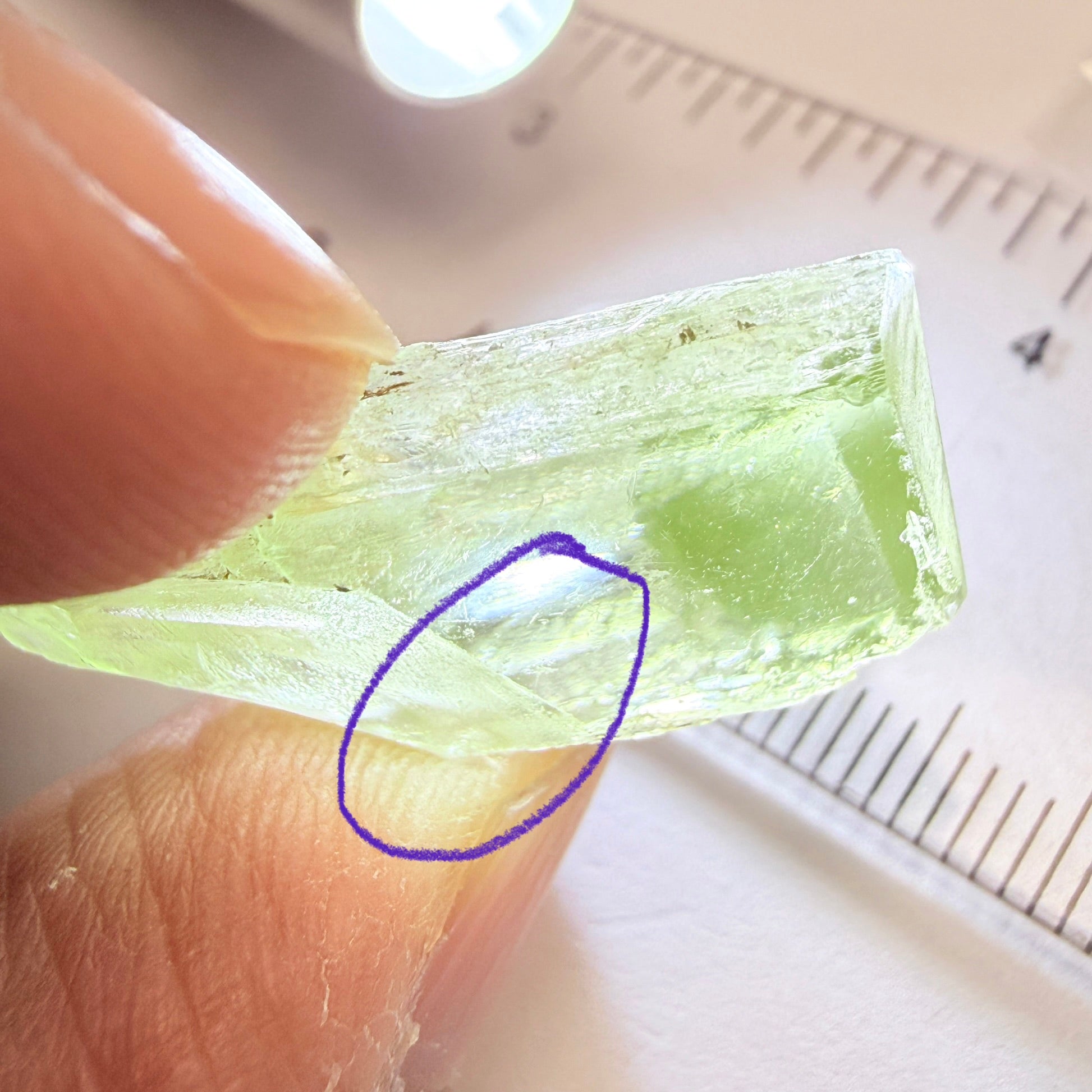 Diopside Crystal, 44.78ct, Merelani, Tanzania, Untreated Unheated,  with some fractures on the outside tip area protruding inwards, see pics I have circled the fracture area. Bulk of main center chunk clean vvs-if