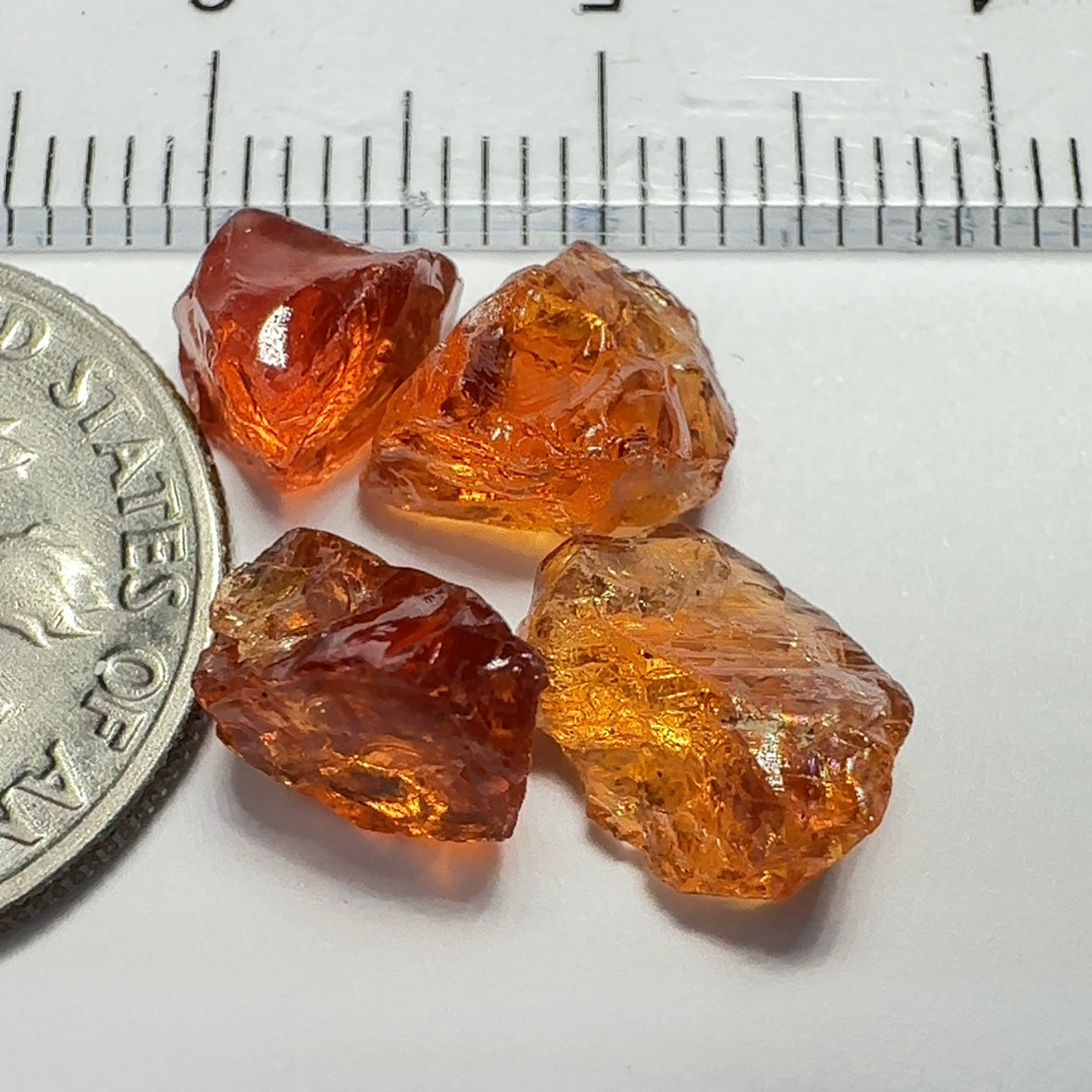 9.18ct Spessartite Carrot Colour Garnet Lot, Tanzania. Untreated Unheated. 2.16ct - 2.42ct. Slightly Included