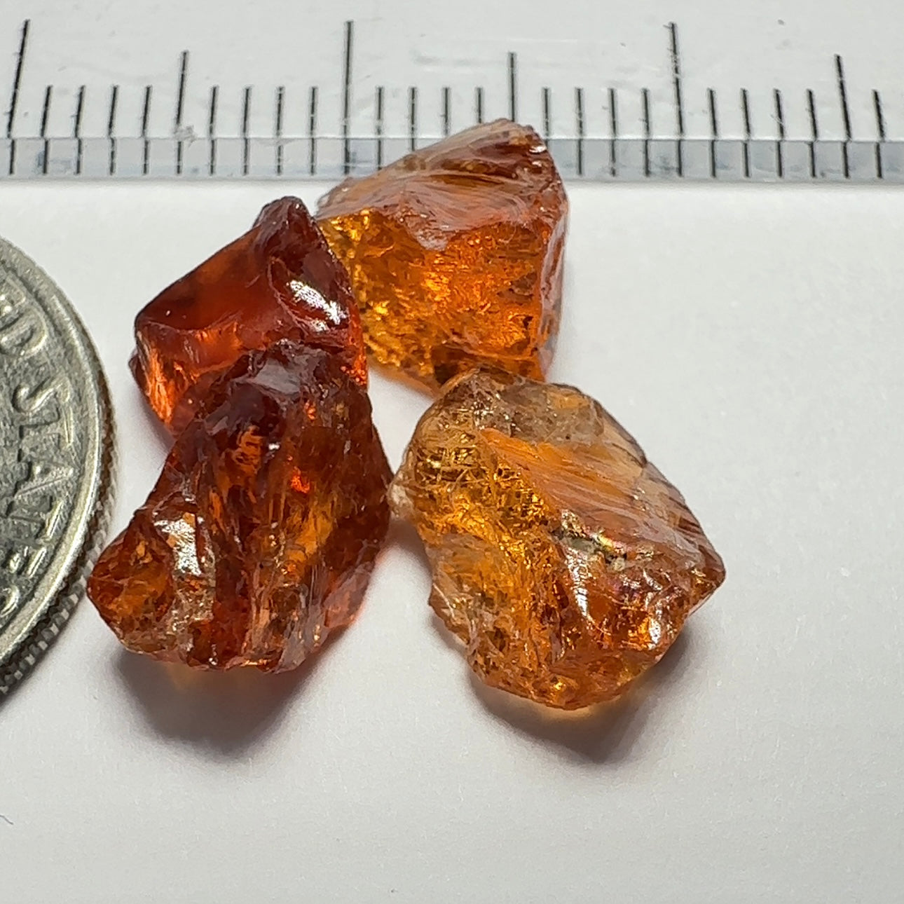 9.18ct Spessartite Carrot Colour Garnet Lot, Tanzania. Untreated Unheated. 2.16ct - 2.42ct. Slightly Included