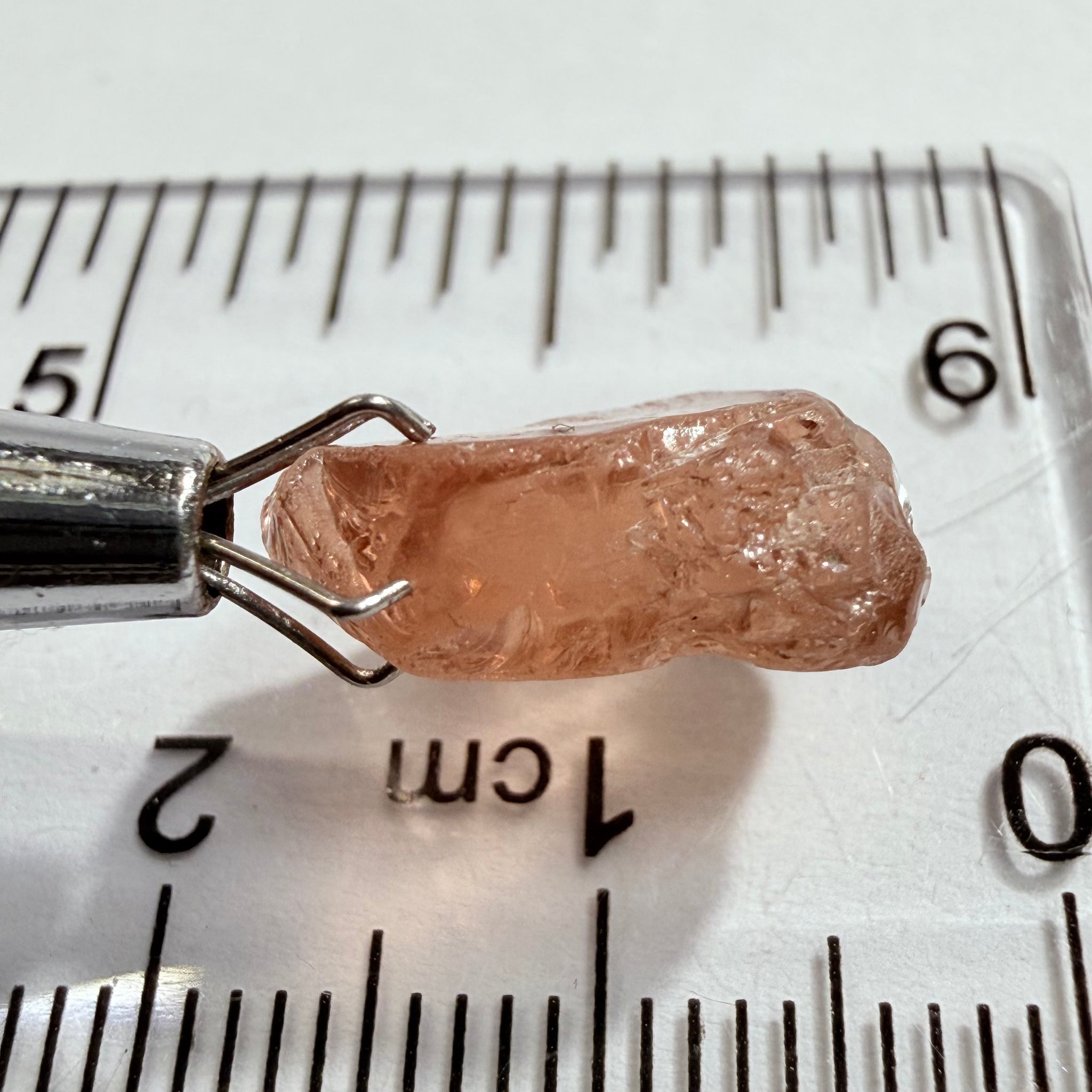 Malaya Garnet, 8.03ct, Tanzania, Untreated Unheated, fine needles causing a silky appearance, flat shape, see side pics