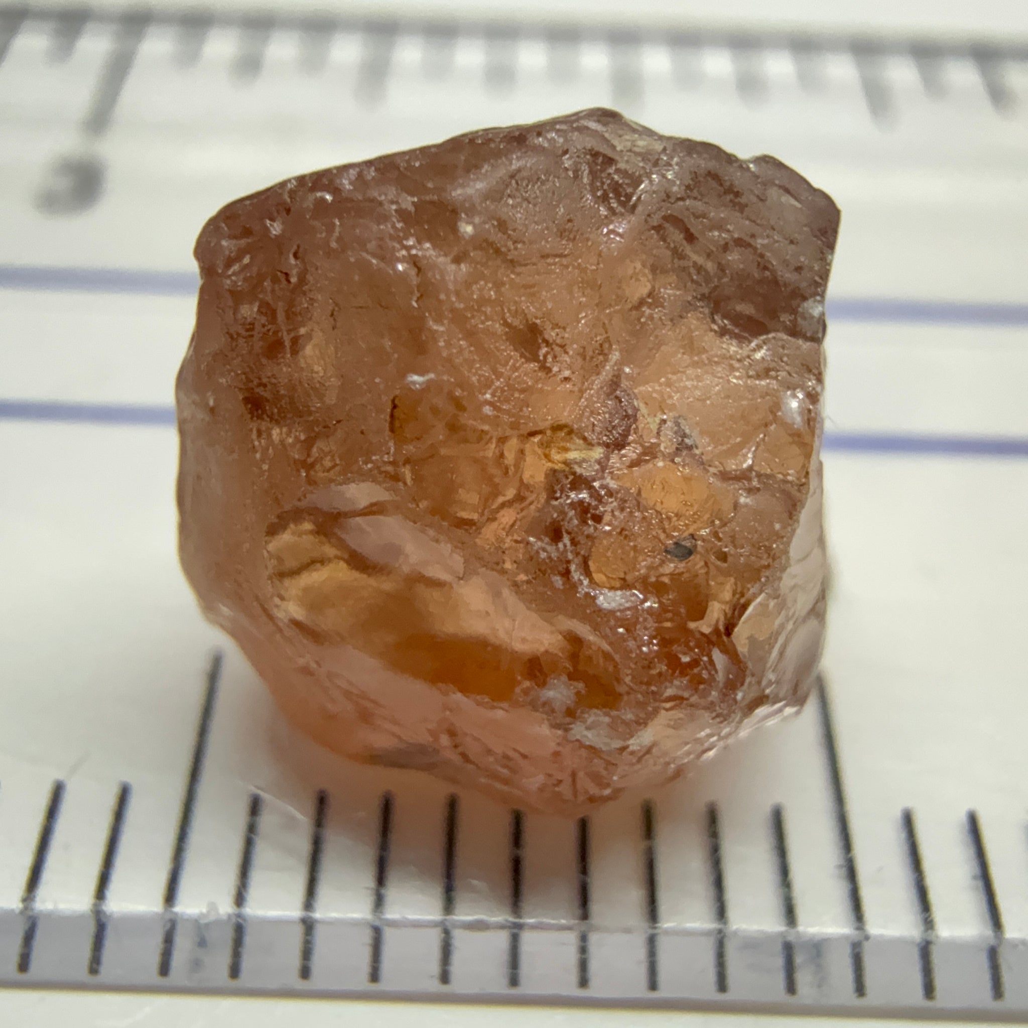 Peach Malaya Garnet, 6.02ct, slight crack 1mm inside from skin, slight gunk on skin on one end needs to be removed on disk, rest slightly silky, Unheated Untreated, Umba Valley Tanzania