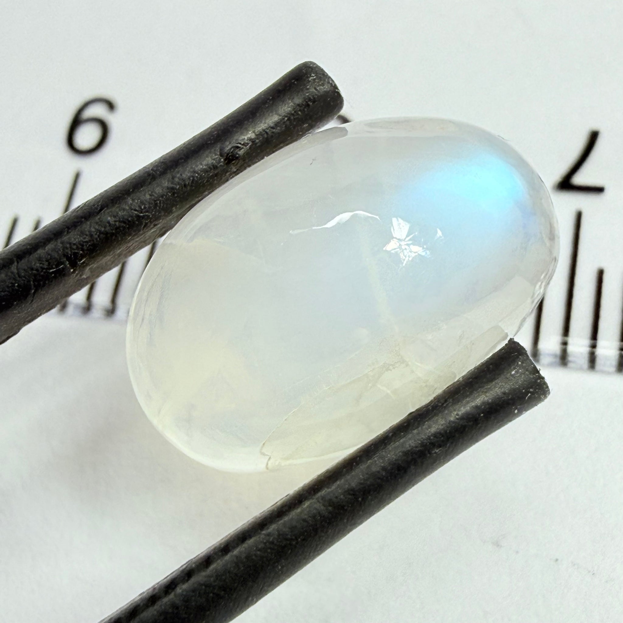 Blue Sheen Moonstone Cabochon, 6.35ct, Tanzania, Untreated Unheated, the sheen is more sleeping to one long end in this one