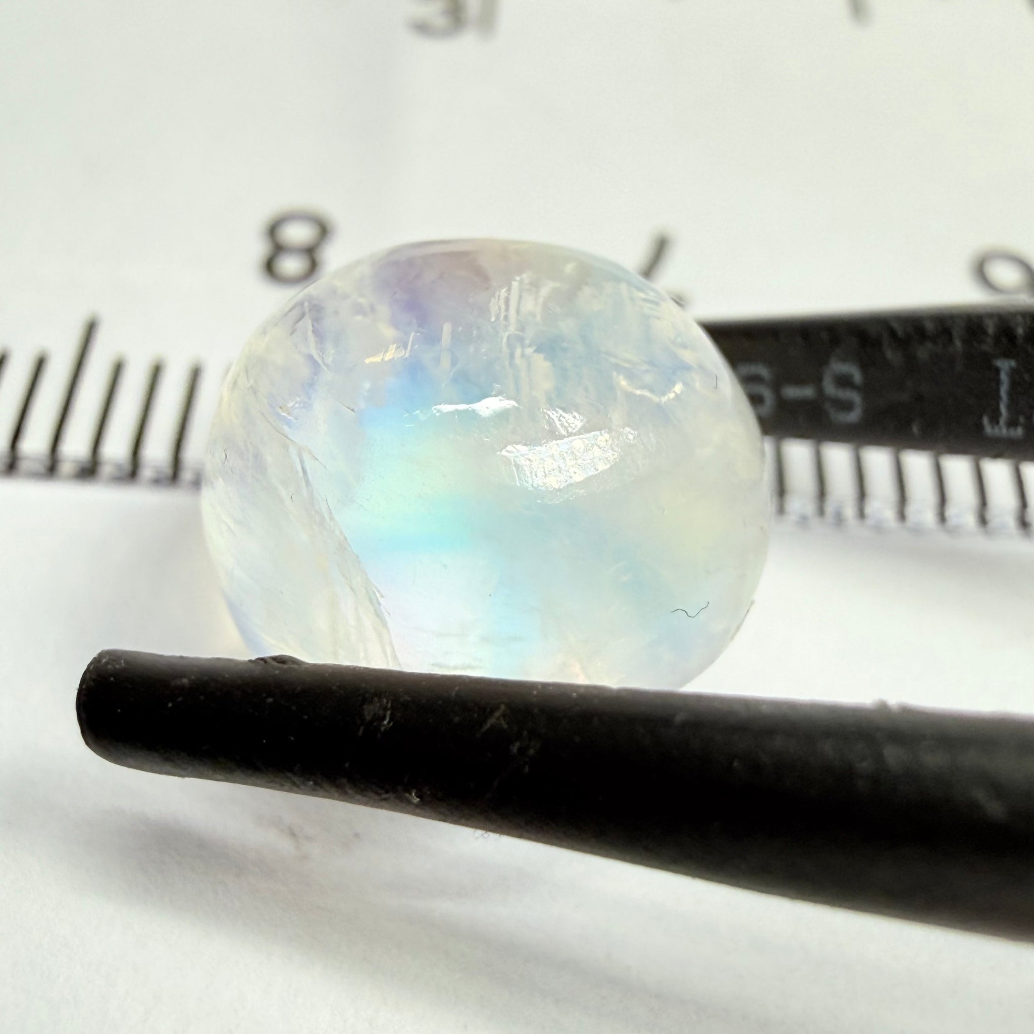 Blue Sheen Moonstone Cabochon, 7.07ct, Tanzania, Untreated Unheated, the sheen is more sleeping to one long end in this one