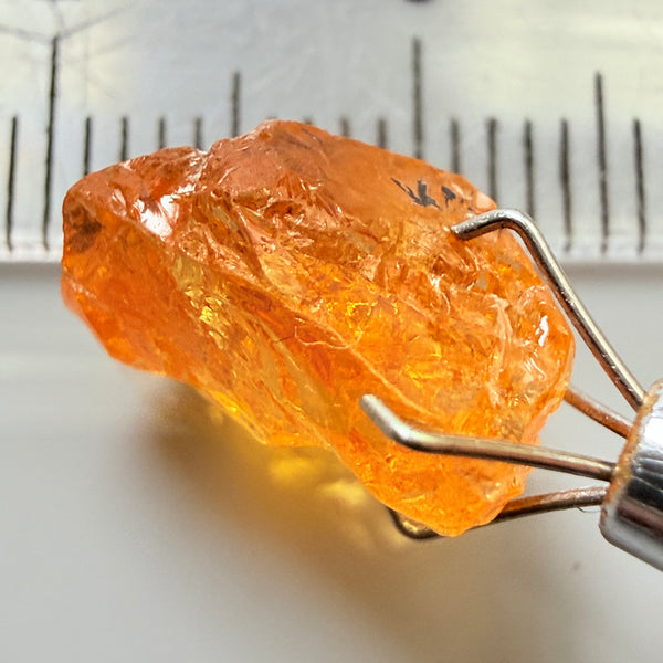 Mandarin Garnet, 5.38ct, Loliondo, Tanzania, Untreated Unheated, slightly included and you might have to slice it in two because of the shape