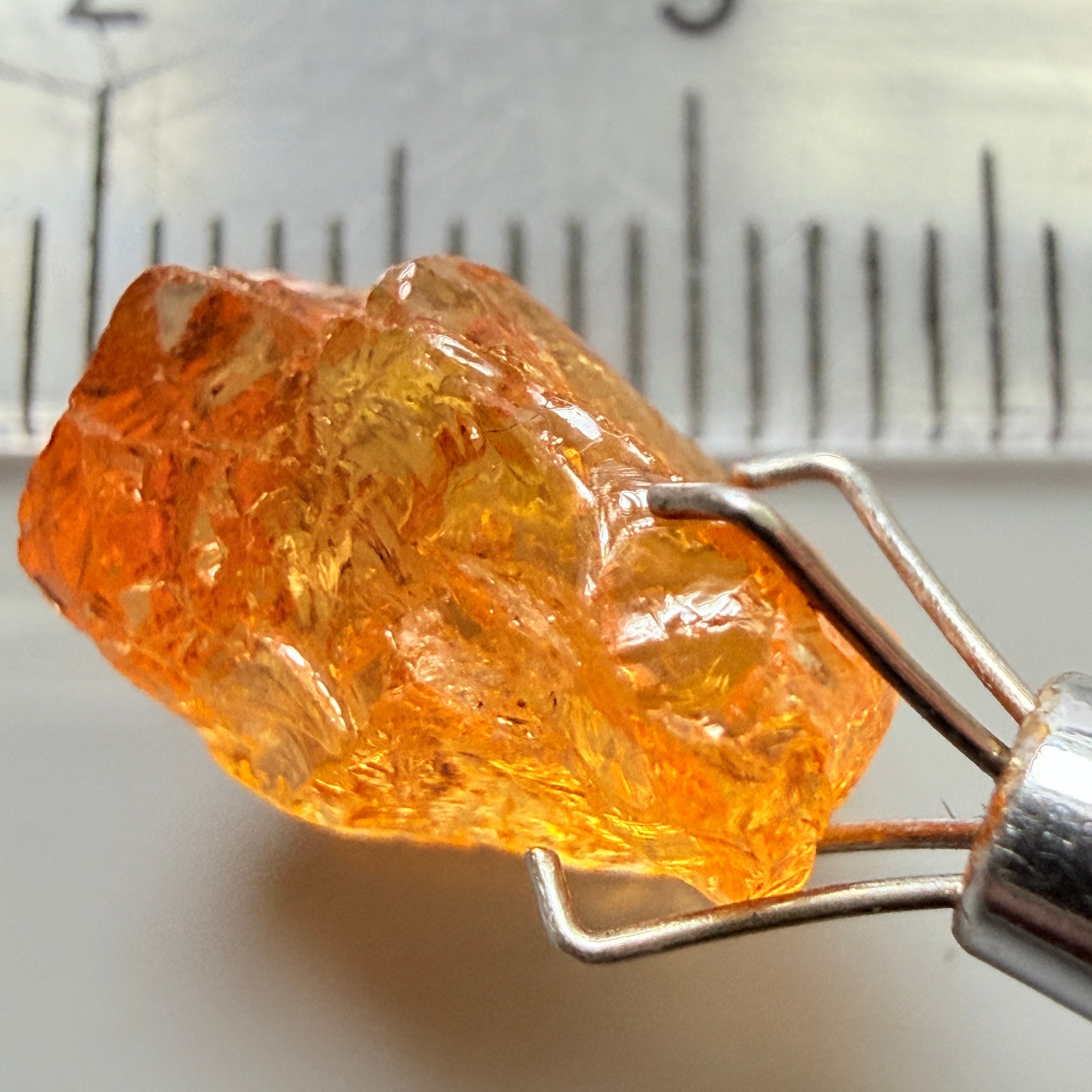 Mandarin Garnet, 5.38ct, Loliondo, Tanzania, Untreated Unheated, slightly included and you might have to slice it in two because of the shape