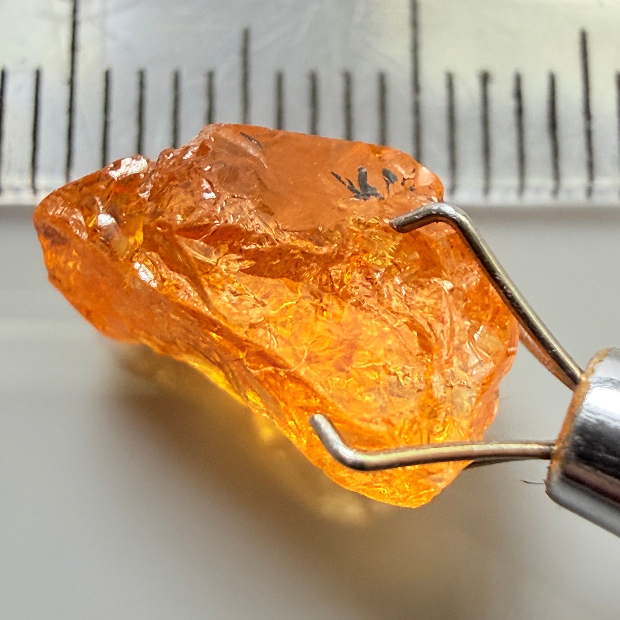 Mandarin Garnet, 5.38ct, Loliondo, Tanzania, Untreated Unheated, slightly included and you might have to slice it in two because of the shape