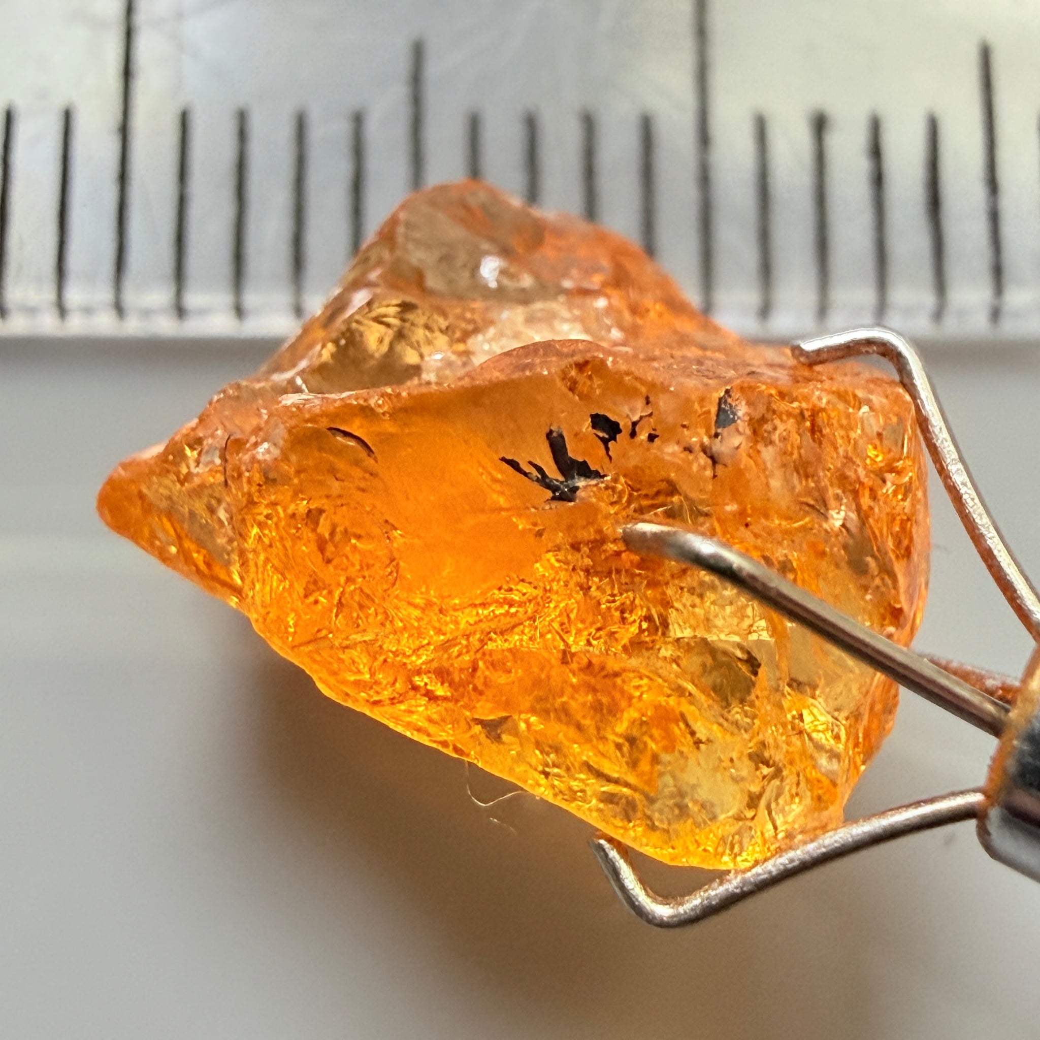Mandarin Garnet, 5.38ct, Loliondo, Tanzania, Untreated Unheated, slightly included and you might have to slice it in two because of the shape