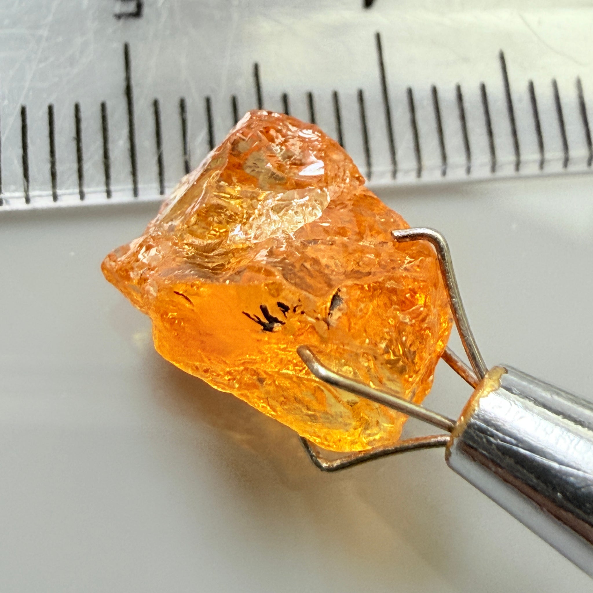 Mandarin Garnet, 5.38ct, Loliondo, Tanzania, Untreated Unheated, slightly included and you might have to slice it in two because of the shape