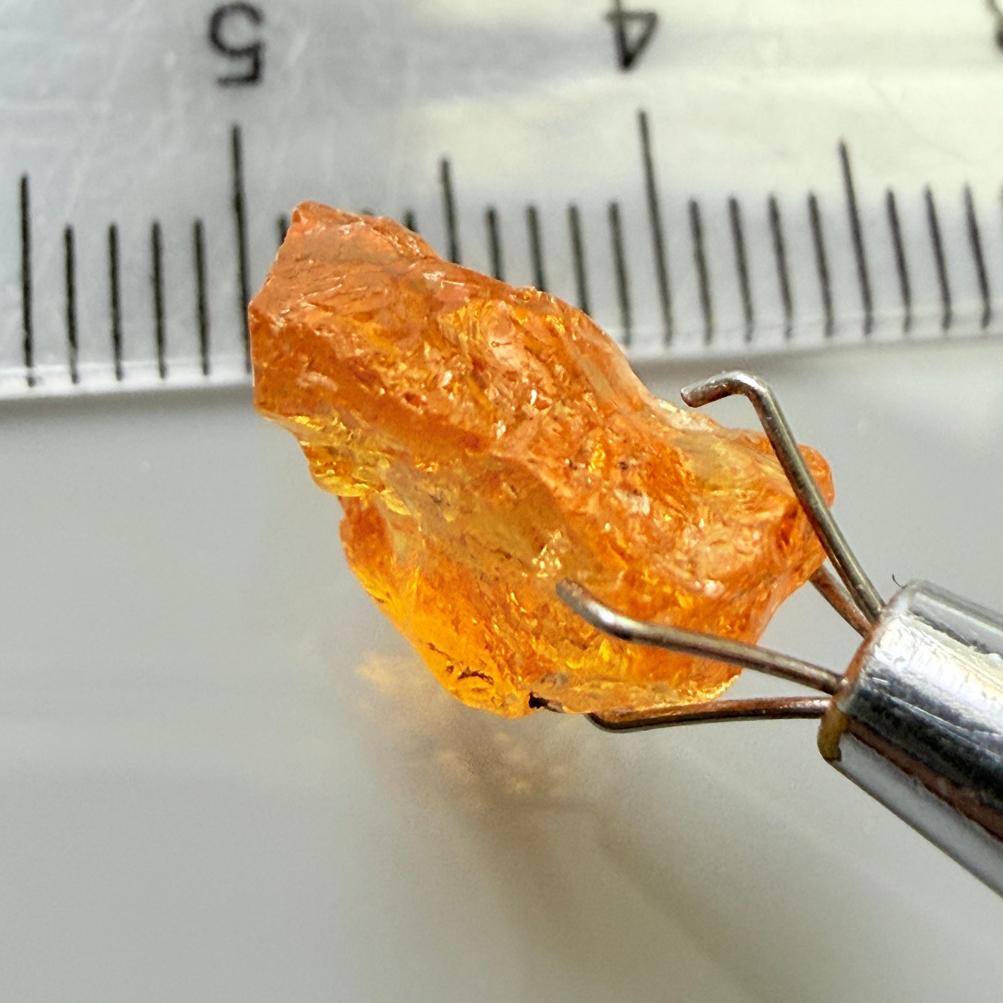 Mandarin Garnet, 5.38ct, Loliondo, Tanzania, Untreated Unheated, slightly included and you might have to slice it in two because of the shape