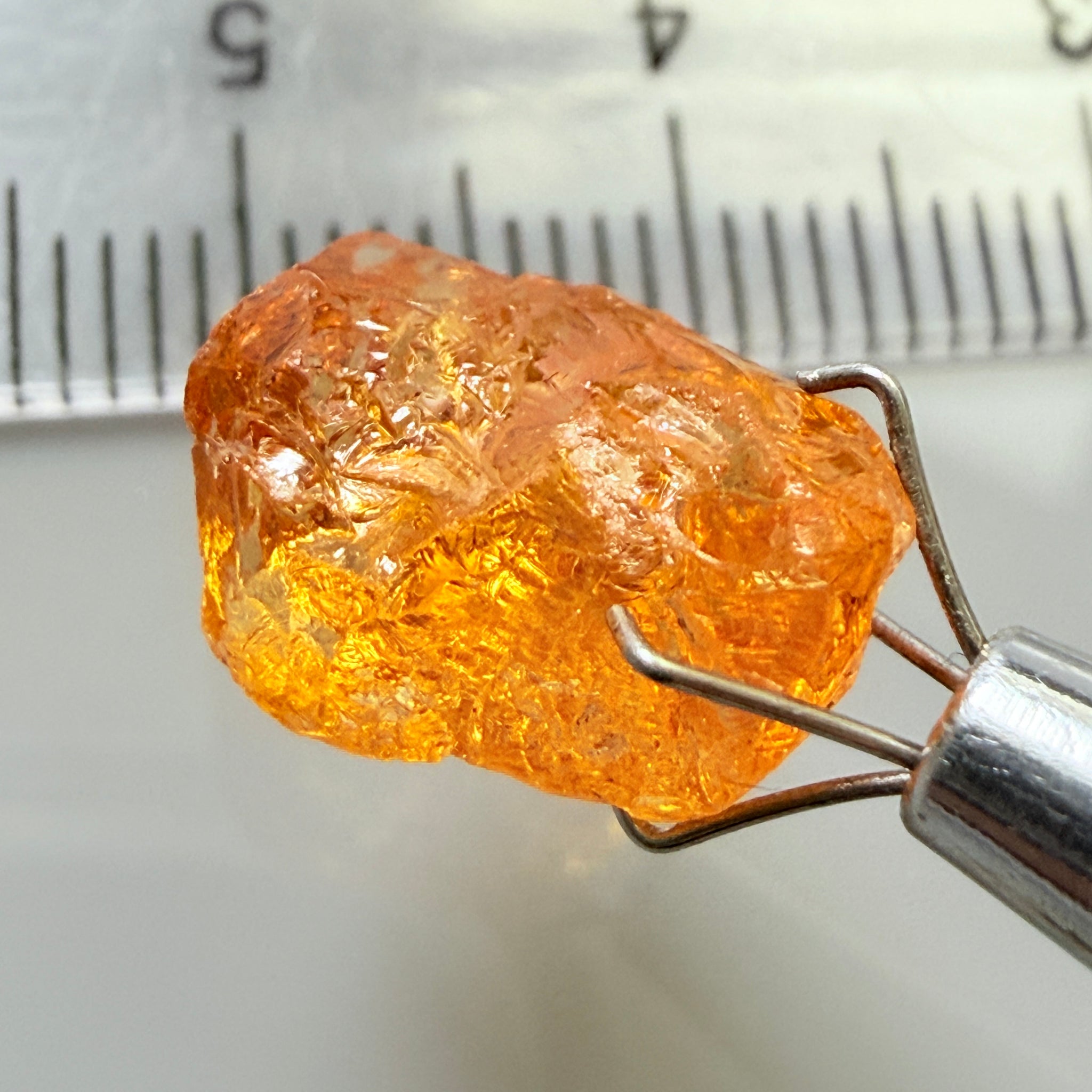 Mandarin Garnet, 5.38ct, Loliondo, Tanzania, Untreated Unheated, slightly included and you might have to slice it in two because of the shape