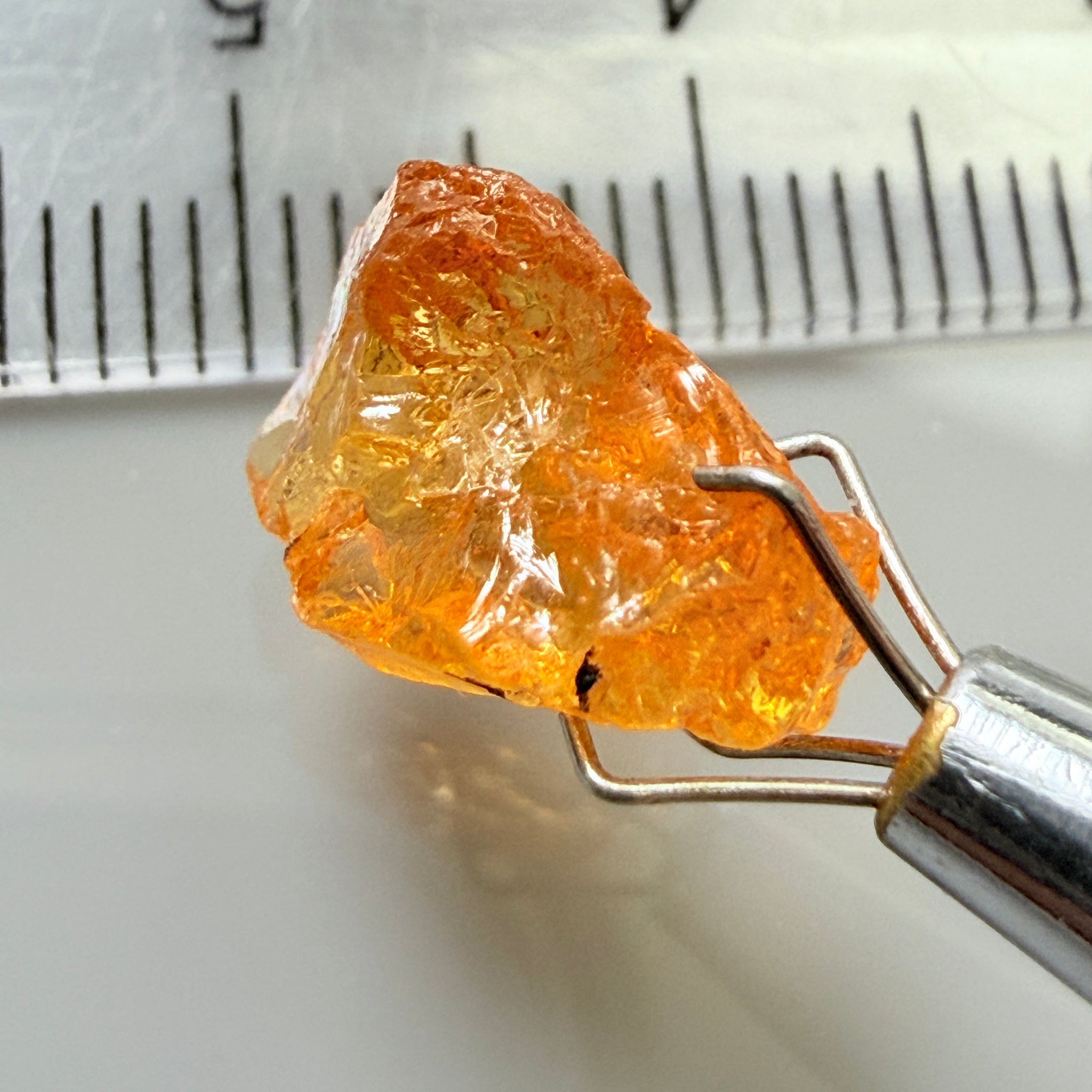 Mandarin Garnet, 5.38ct, Loliondo, Tanzania, Untreated Unheated, slightly included and you might have to slice it in two because of the shape