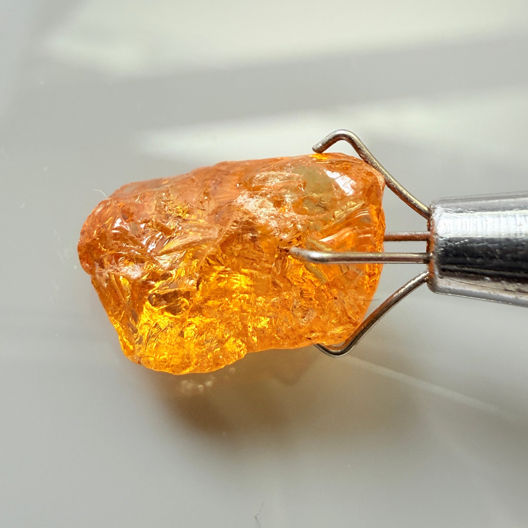 Mandarin Garnet, 5.38ct, Loliondo, Tanzania, Untreated Unheated, slightly included and you might have to slice it in two because of the shape
