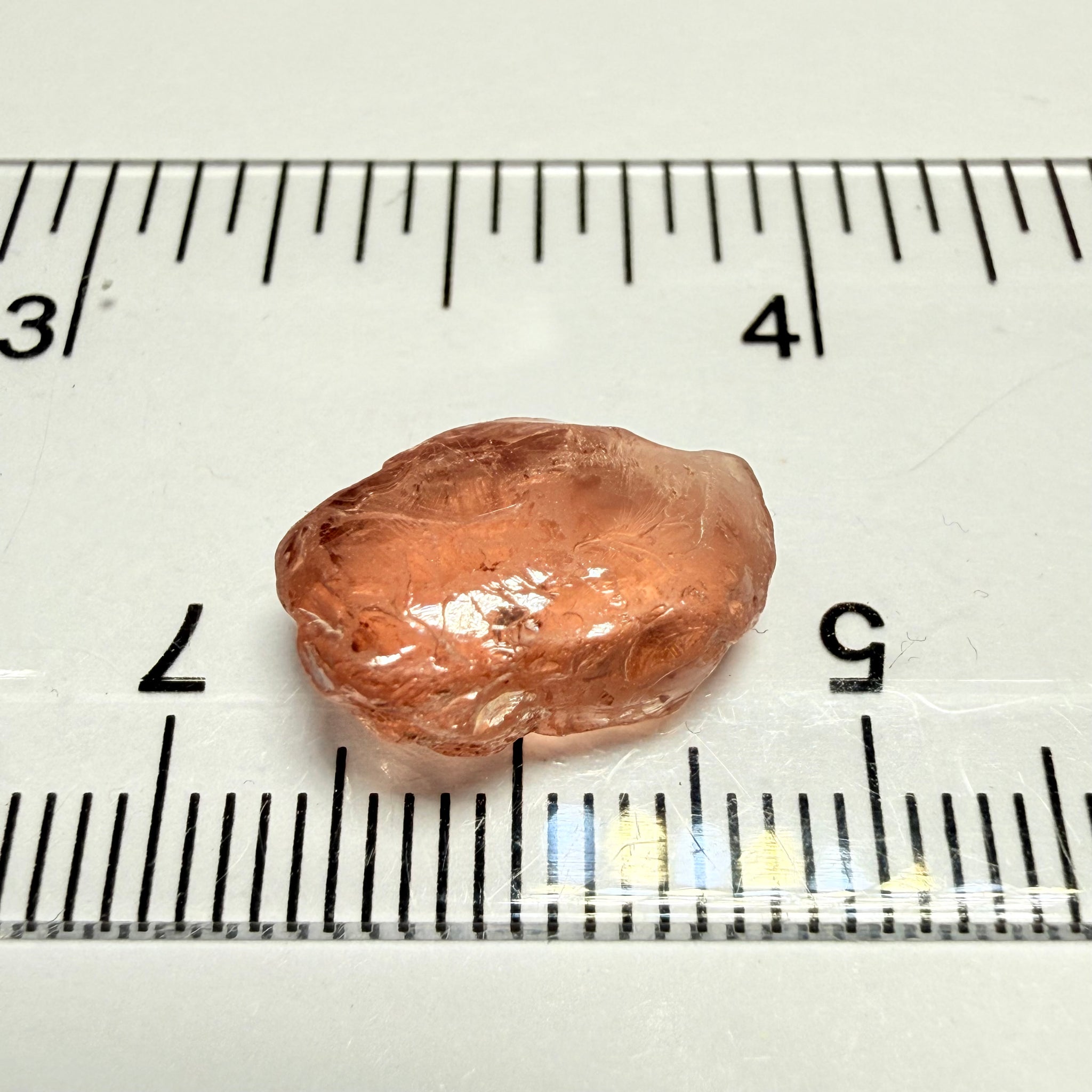 Malaya Garnet, 8.03ct, Tanzania, Untreated Unheated, fine needles causing a silky appearance, flat shape, see side pics