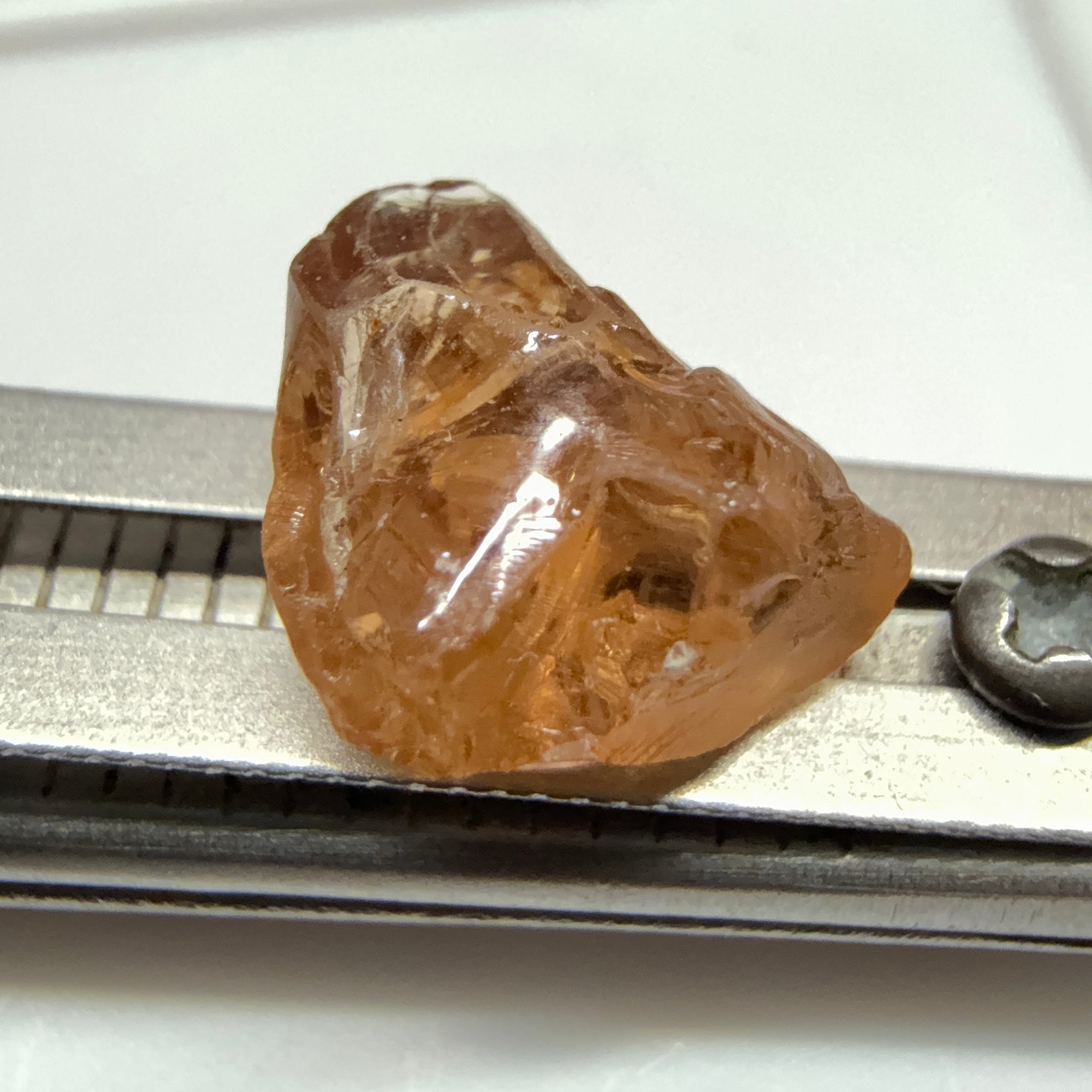 Peach Malaya Garnet, 3.97ct, challenging shape, gunk on outside, will come off on preform, rest vvs, Unheated Untreated, Umba Valley Tanzania