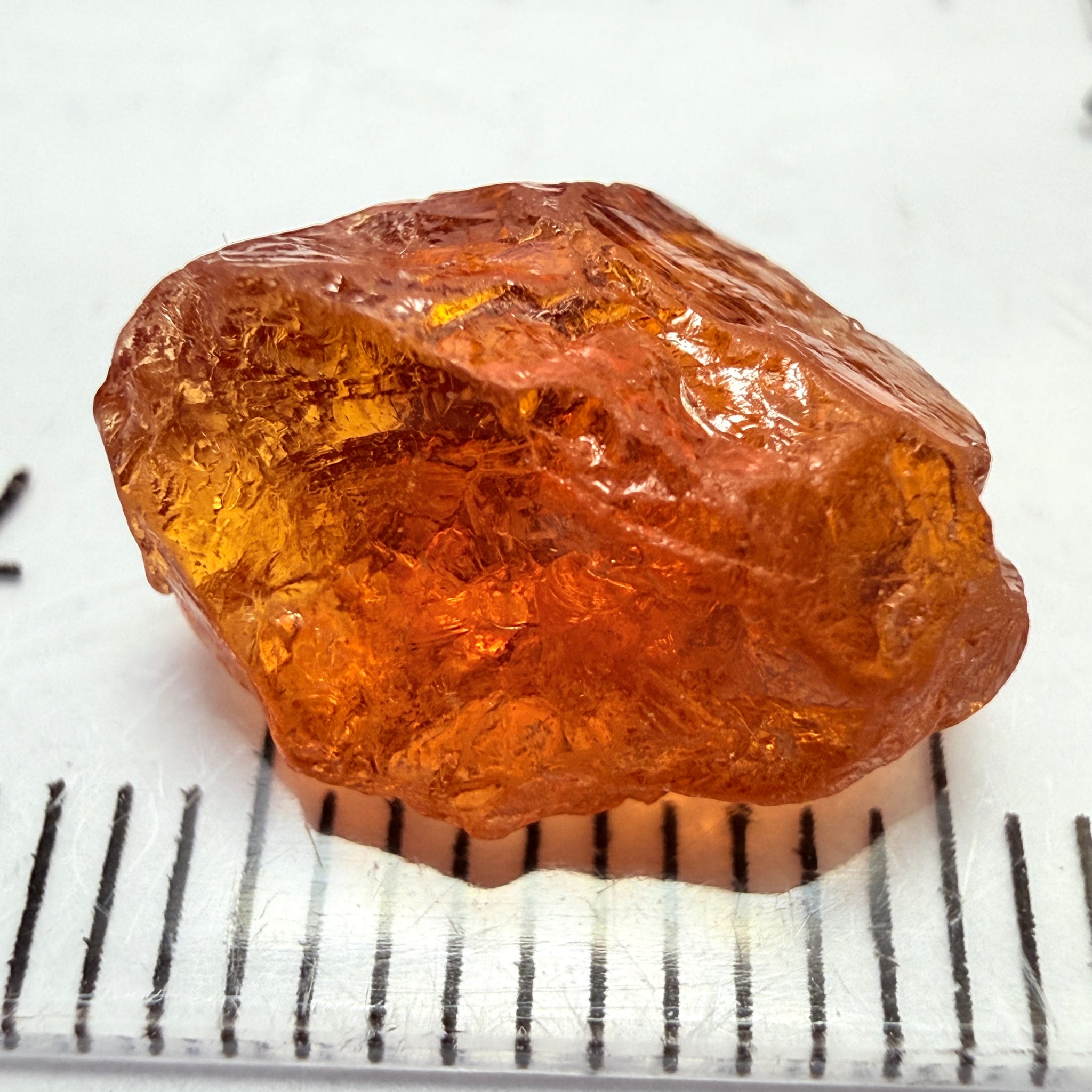 Mandarin Carrot Colour Spessartite Garnet, 5.51ct, Loliondo, Tanzania. Untreated Unheated. Slight crack on outside coming 2mm into stone, rest very slight sugar