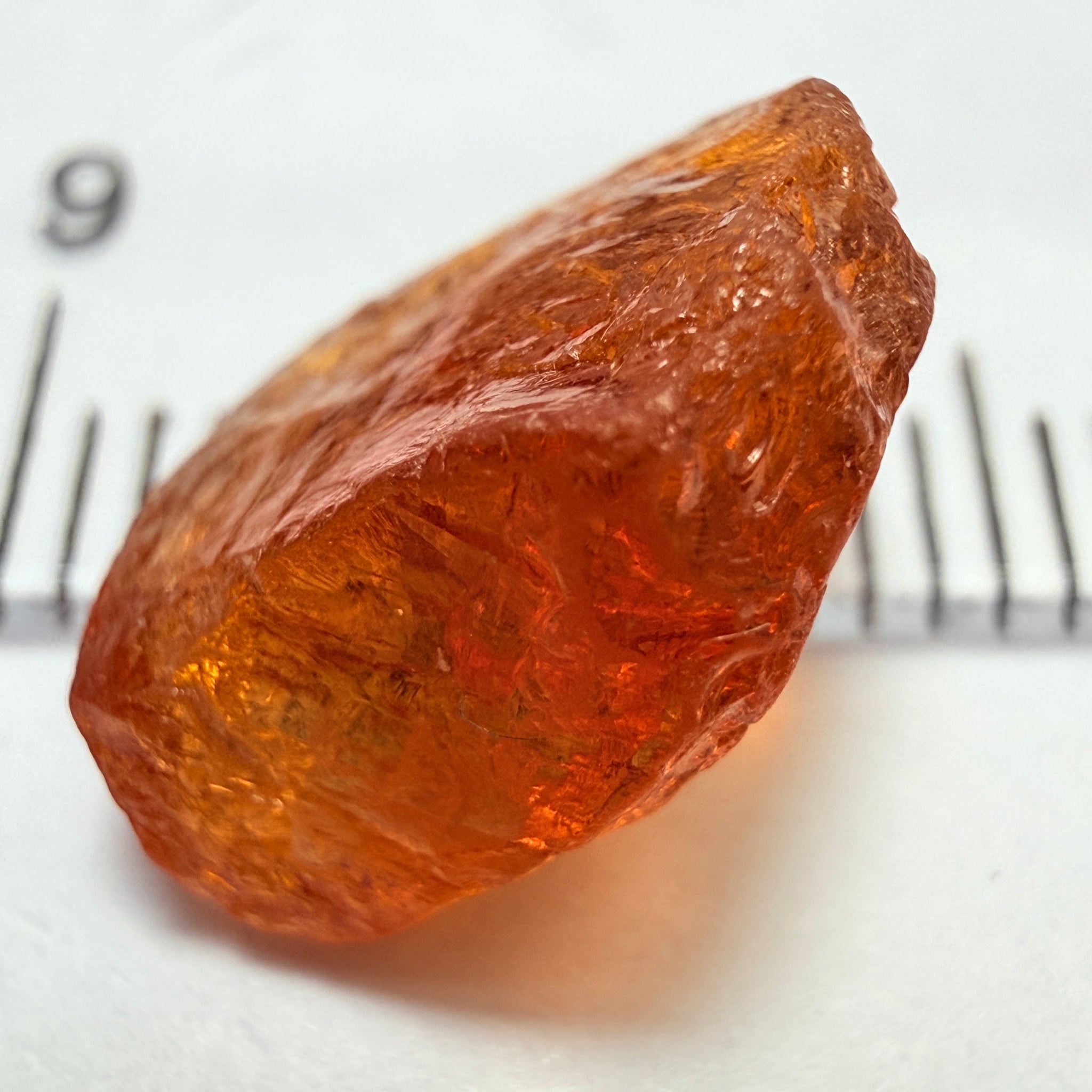 Mandarin Carrot Colour Spessartite Garnet, 5.51ct, Loliondo, Tanzania. Untreated Unheated. Slight crack on outside coming 2mm into stone, rest very slight sugar