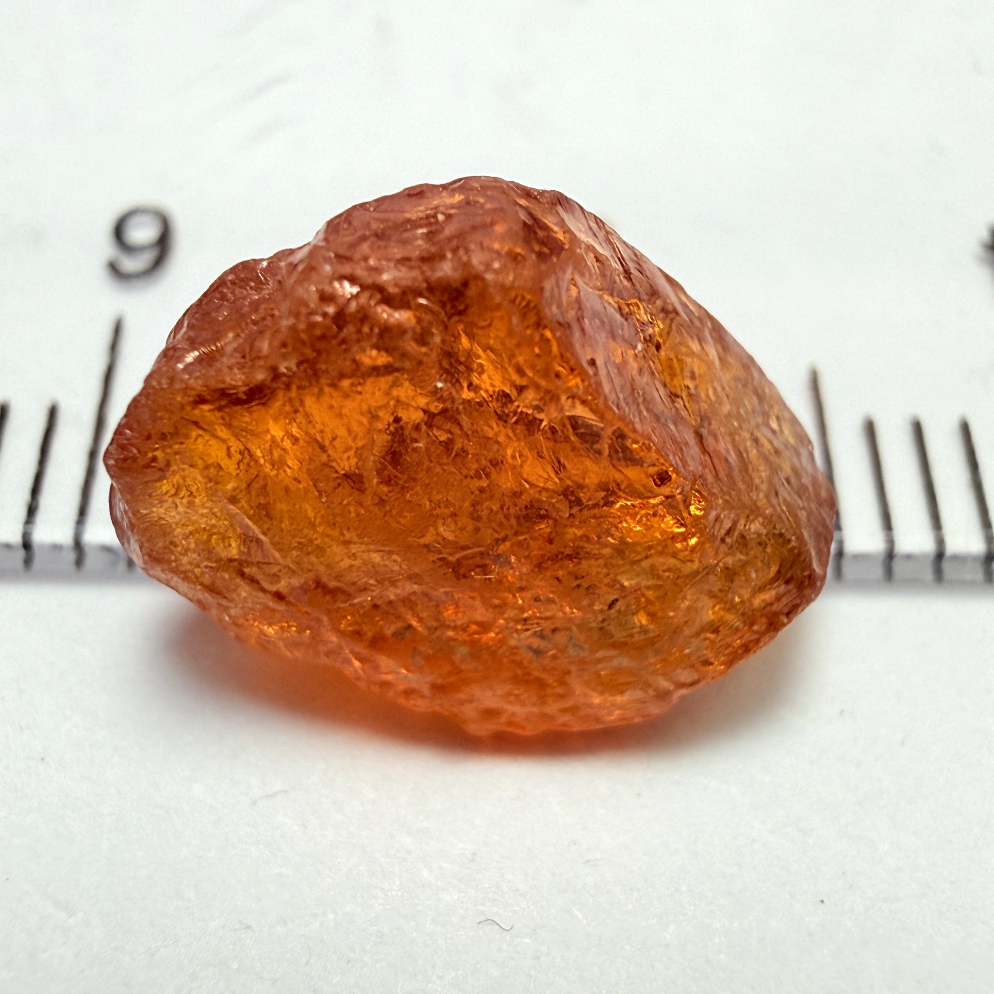 Mandarin Carrot Colour Spessartite Garnet, 5.51ct, Loliondo, Tanzania. Untreated Unheated. Slight crack on outside coming 2mm into stone, rest very slight sugar