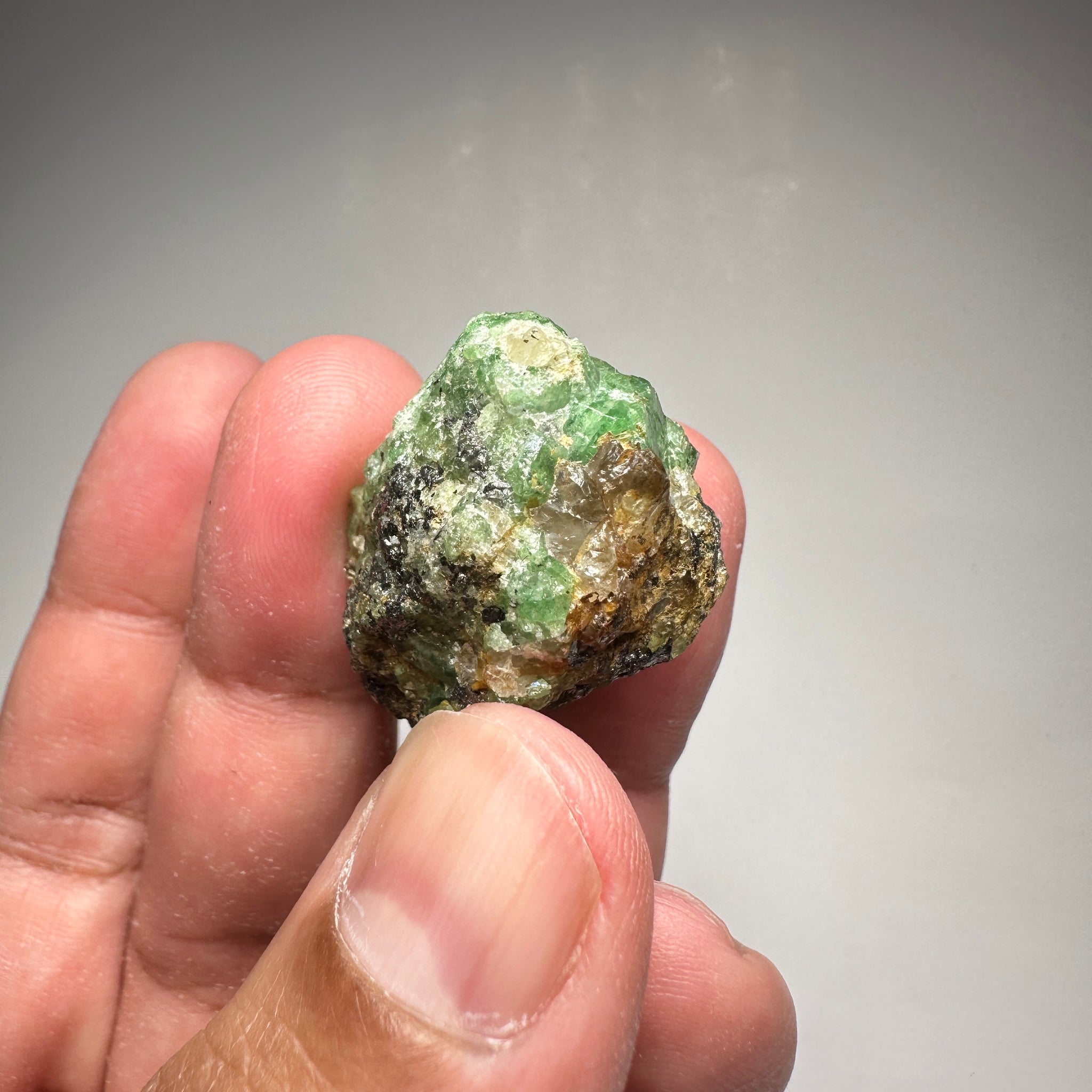 Tsavorite Crystal With Tanzanite And Pyrite on Matrix, 24.50gm / 122.50ct, Merelani, Tanzania. 28 x 22 x 21mm