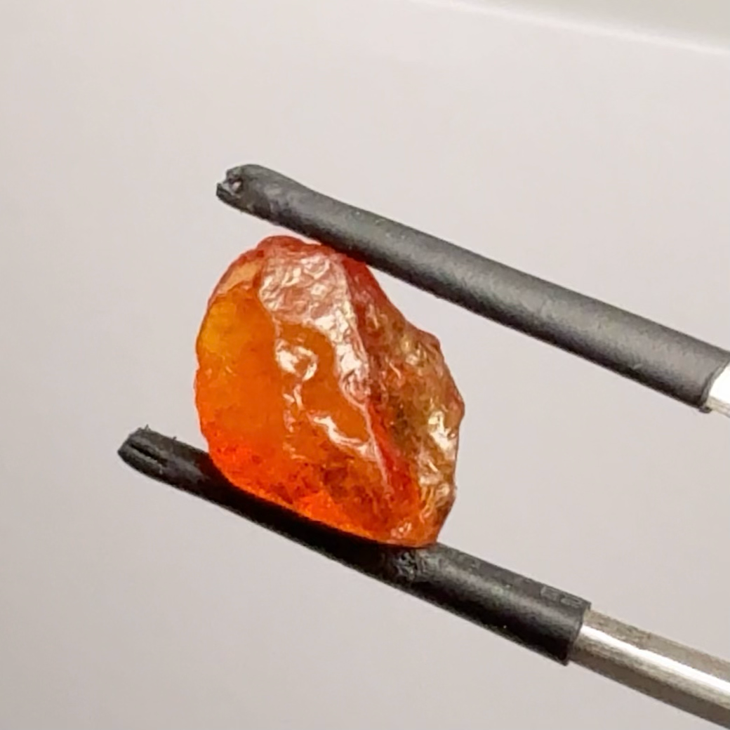 Mandarin Carrot Colour Spessartite Garnet, 5.51ct, Loliondo, Tanzania. Untreated Unheated. Slight crack on outside coming 2mm into stone, rest very slight sugar